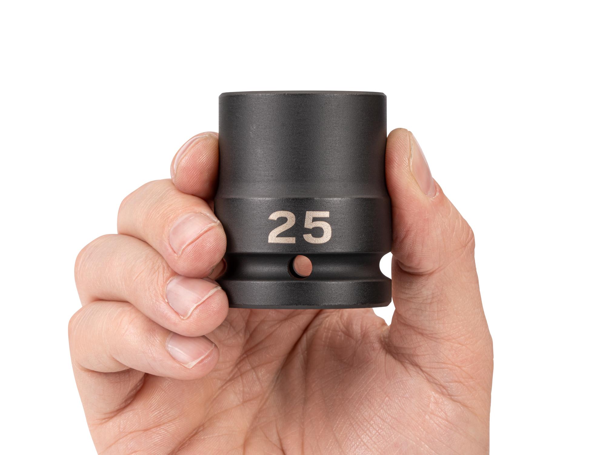 Person holding Tekton impact drive 6-point socket. Item #SID32125