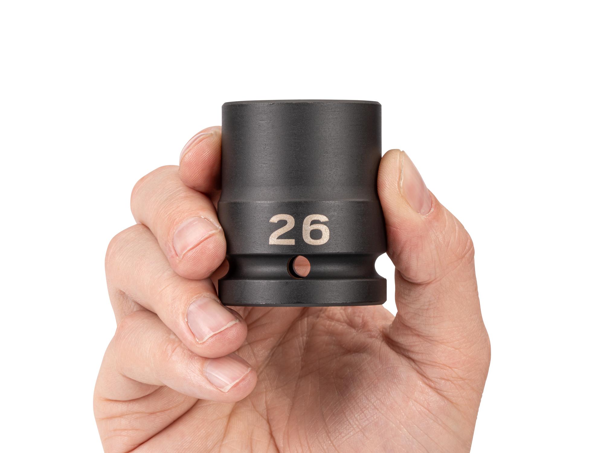 Person holding Tekton impact drive 6-point socket. Item #SID32126