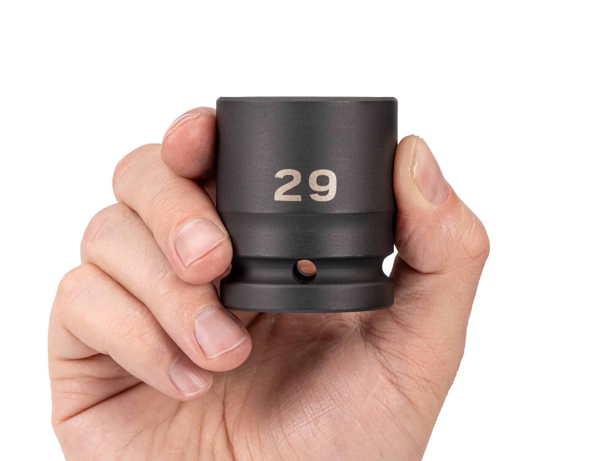Person holding Tekton impact drive 6-point socket. Item #SID32129