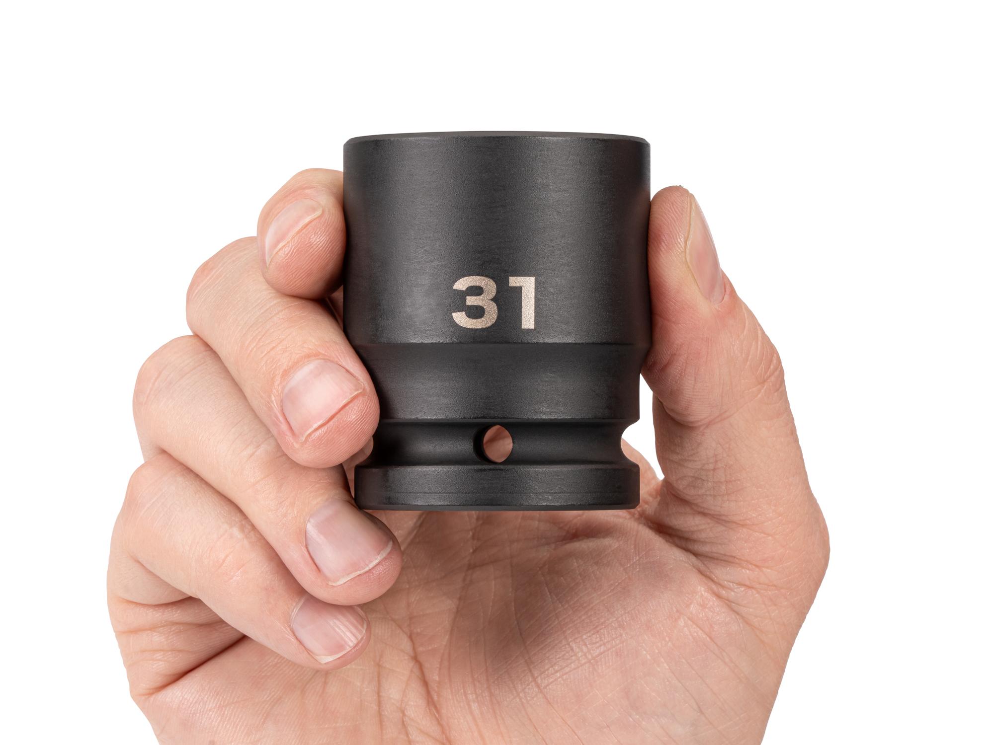 Person holding Tekton impact drive 6-point socket. Item #SID32131