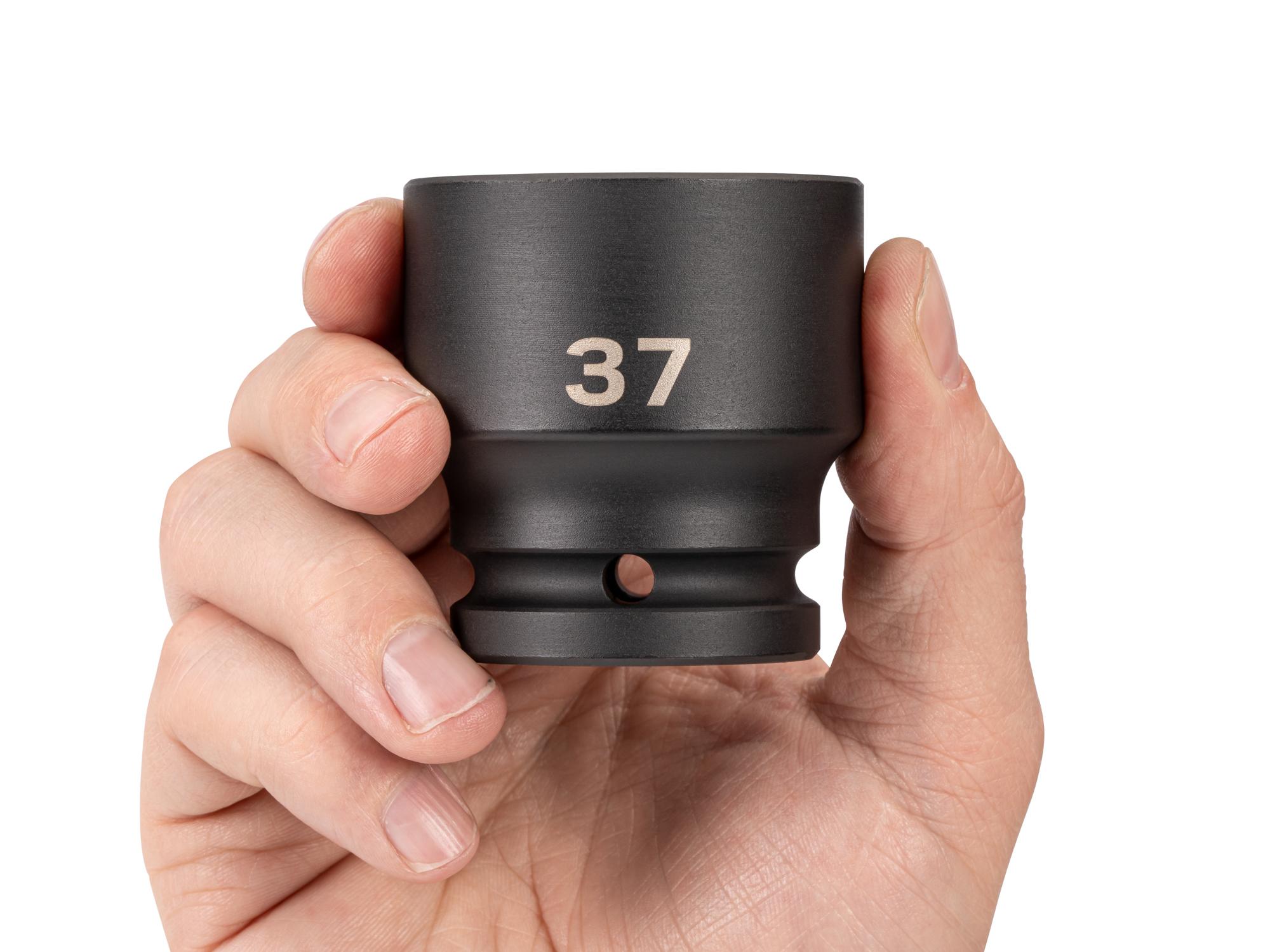 Person holding Tekton impact drive 6-point socket. Item #SID32137