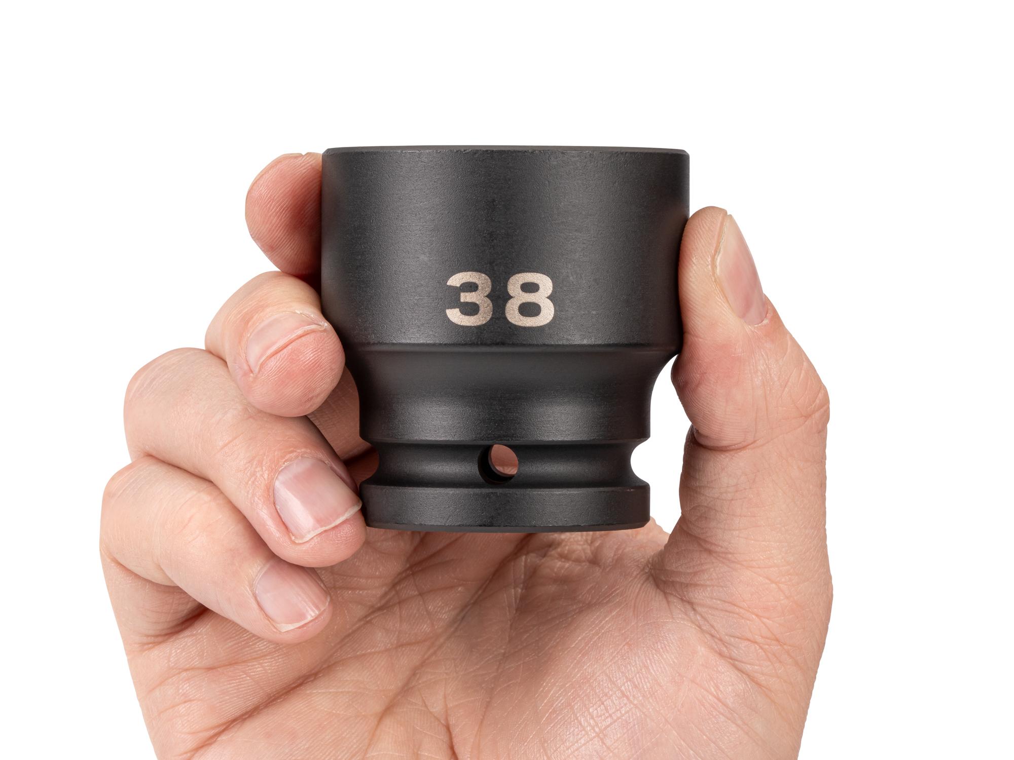 Person holding Tekton impact drive 6-point socket. Item #SID32138