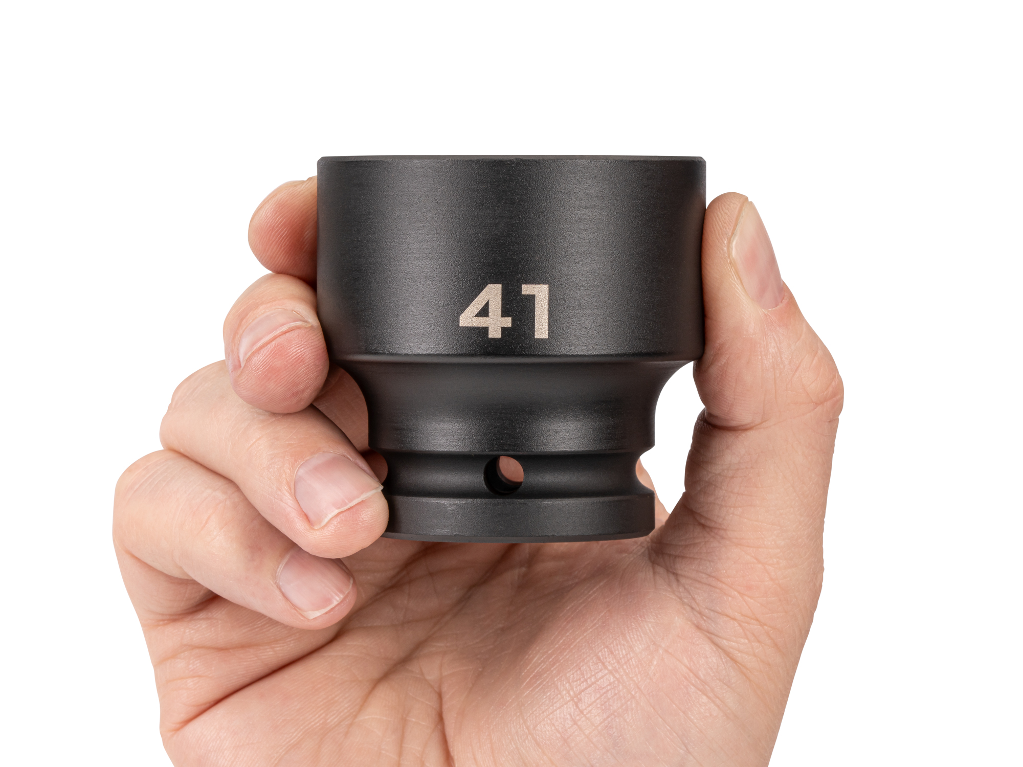Person holding Tekton 41 millimeterimpact drive 6-point socket. Item #SID32141