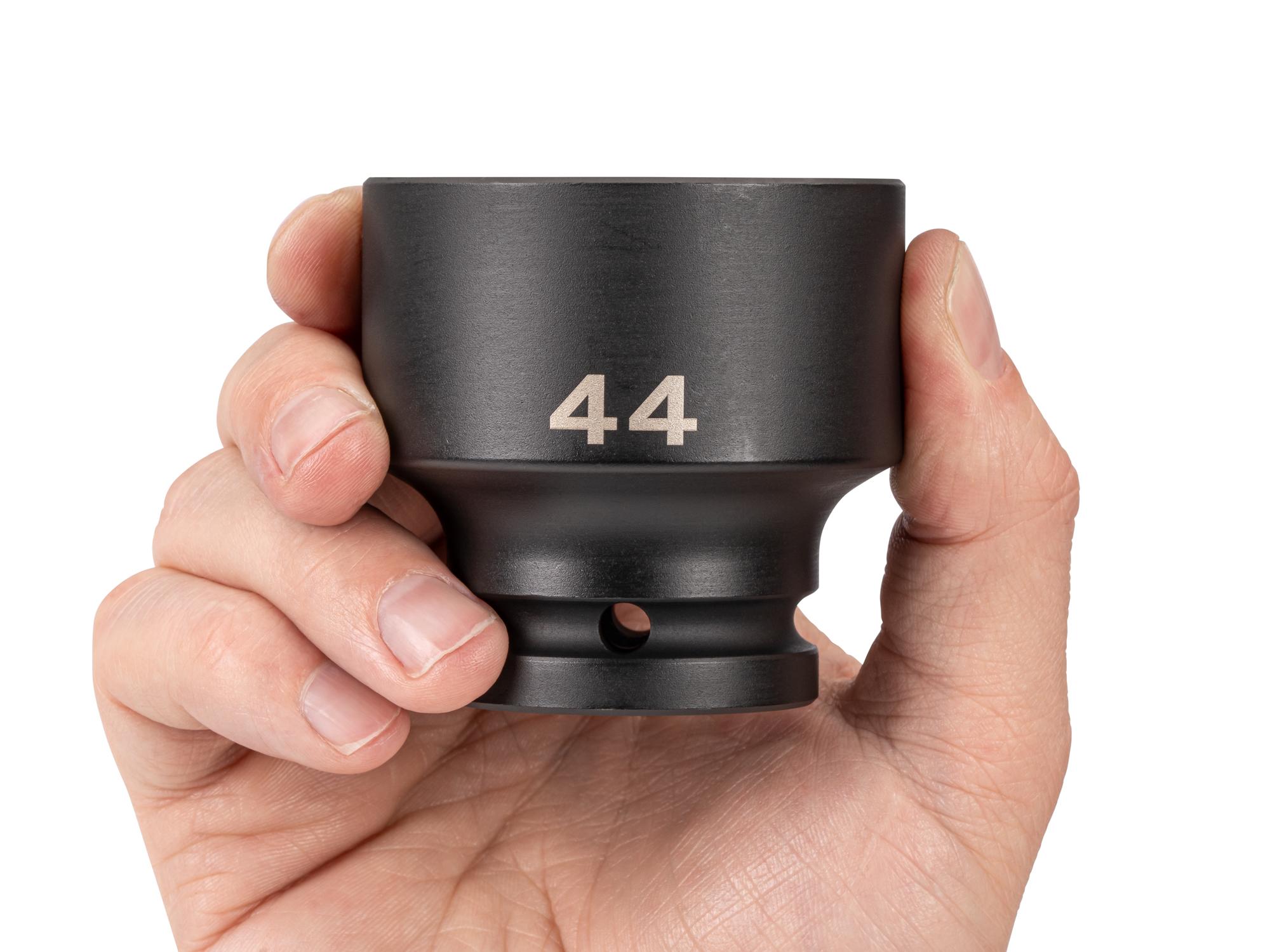 Person holding Tekton impact drive 6-point socket. Item #SID32144
