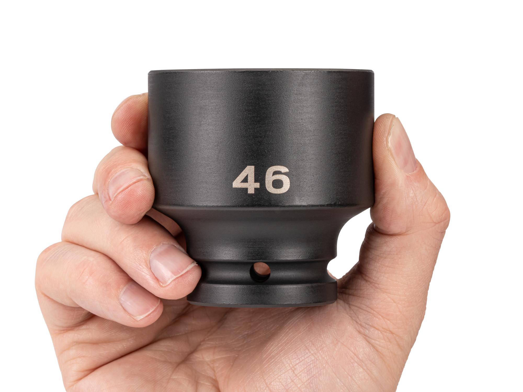 Person holding Tekton impact drive 6-point socket. Item #SID32146