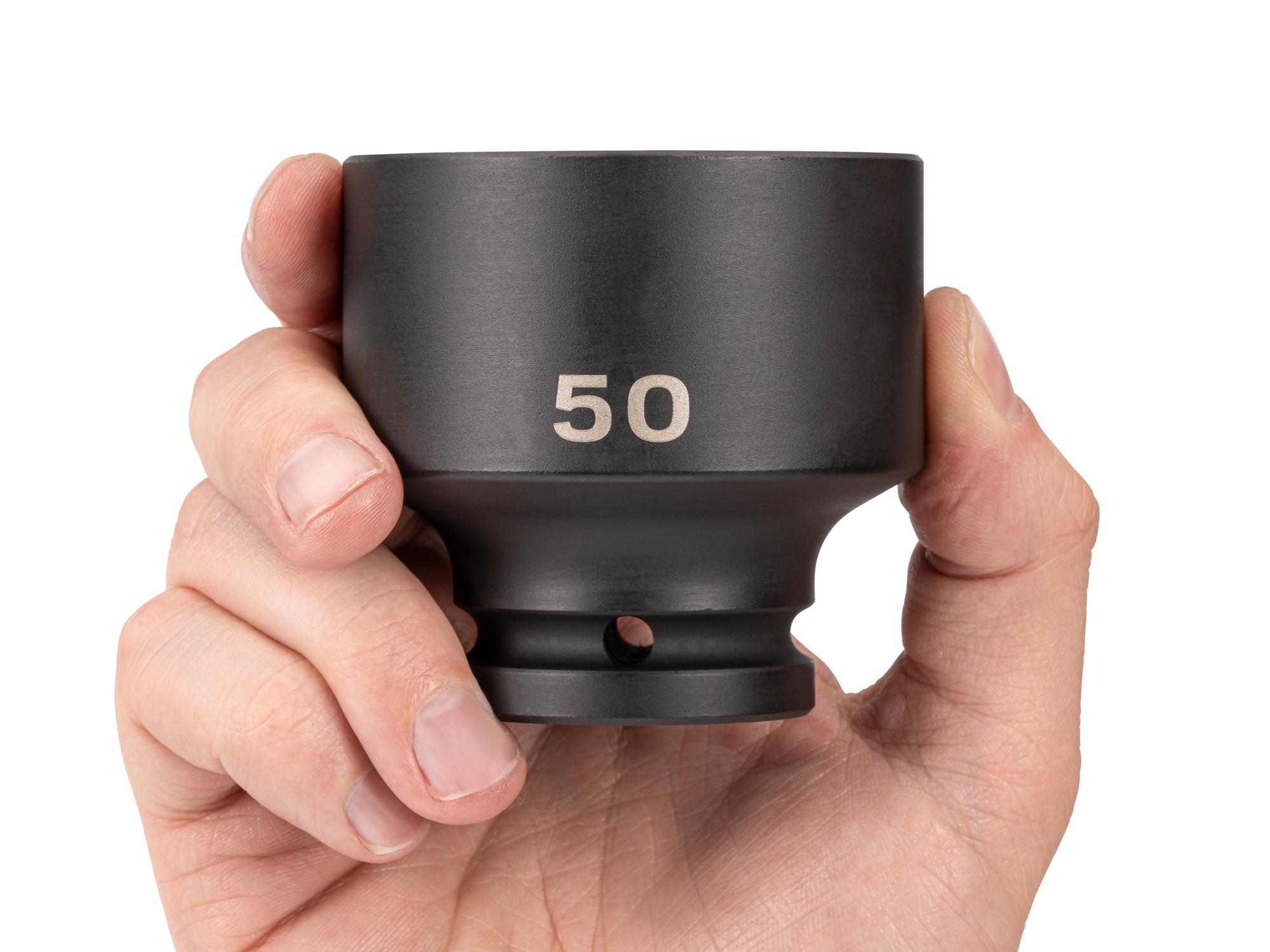 Person holding Tekton impact drive 6-point socket. Item #SID32150