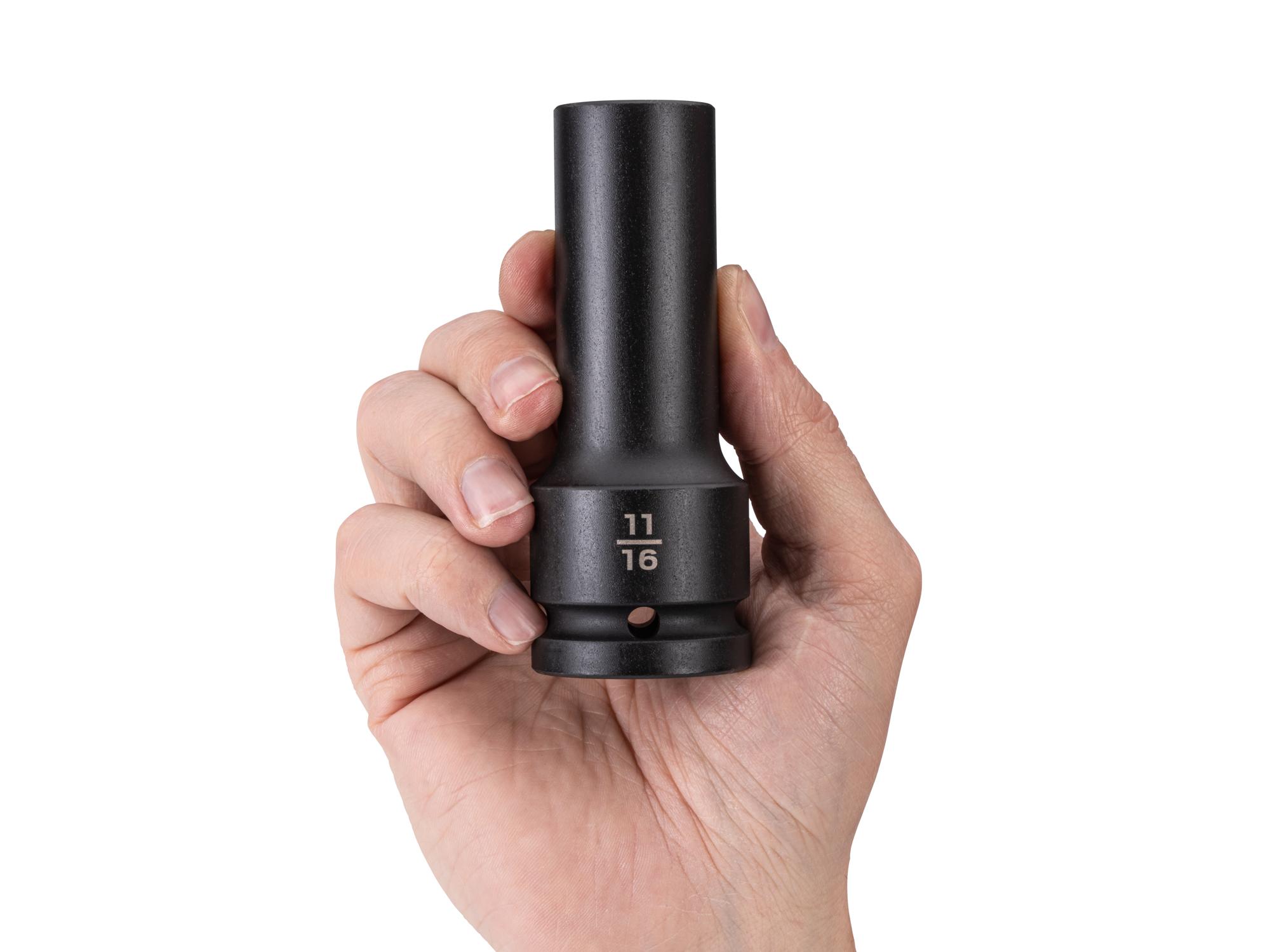 Person holding Tekton impact drive 6-point socket. Item #SID33017