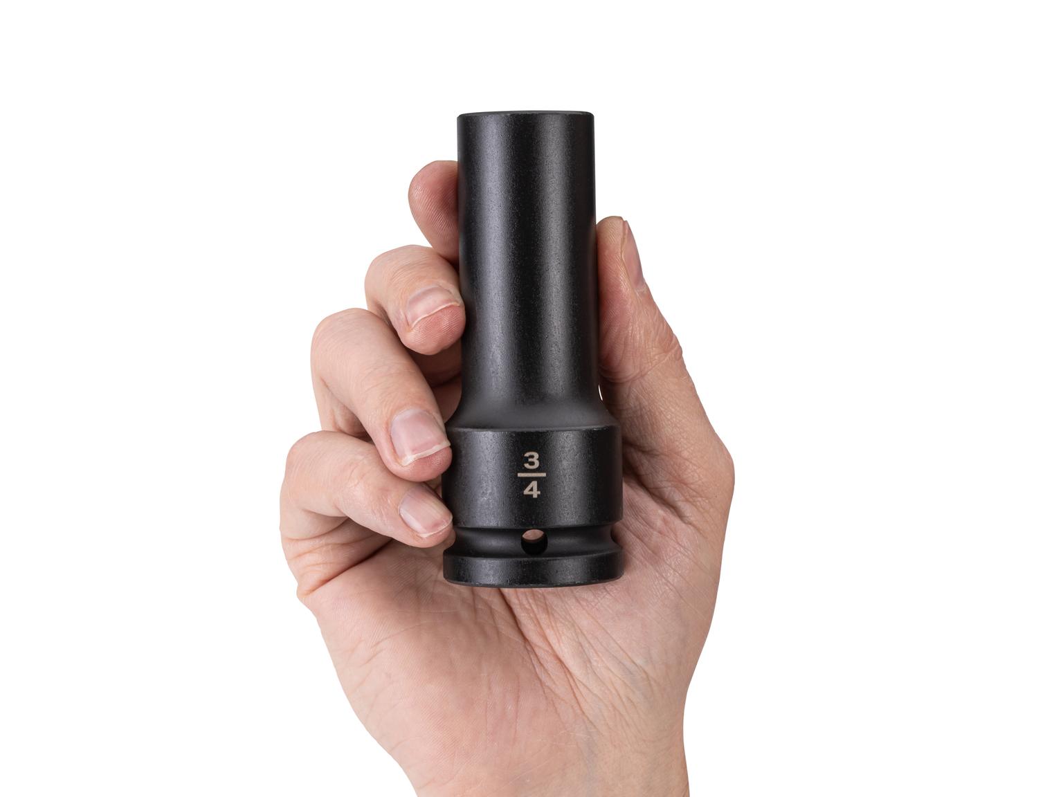 Person holding Tekton impact drive 6-point socket. Item #SID33019