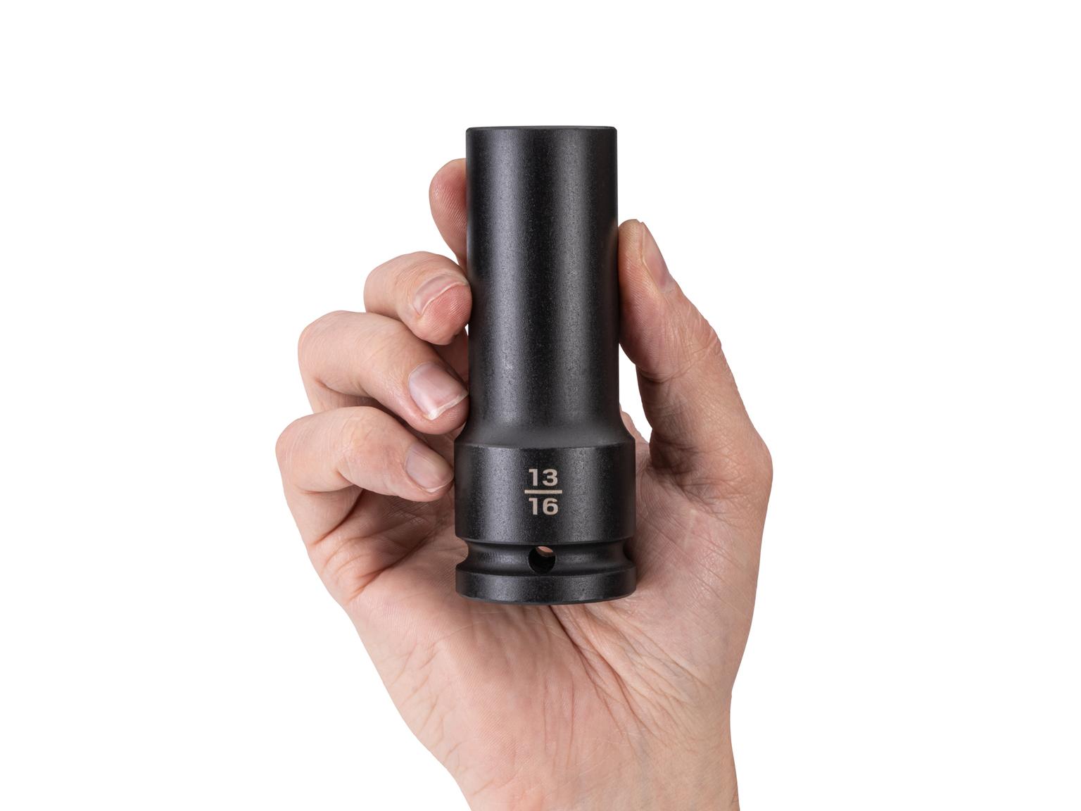 Person holding Tekton impact drive 6-point socket. Item #SID33021