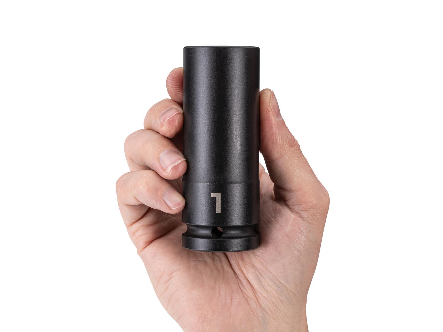 Person holding Tekton impact drive 6-point socket. Item #SID33025