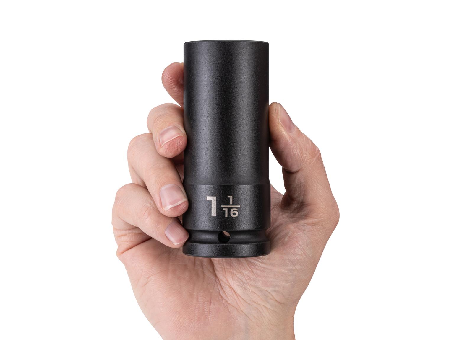 Person holding Tekton impact drive 6-point socket. Item #SID33027