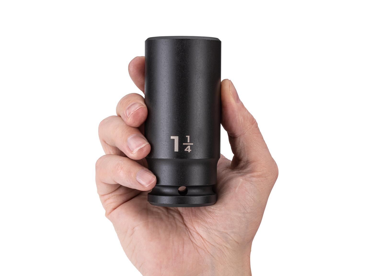 Person holding Tekton impact drive 6-point socket. Item #SID33032