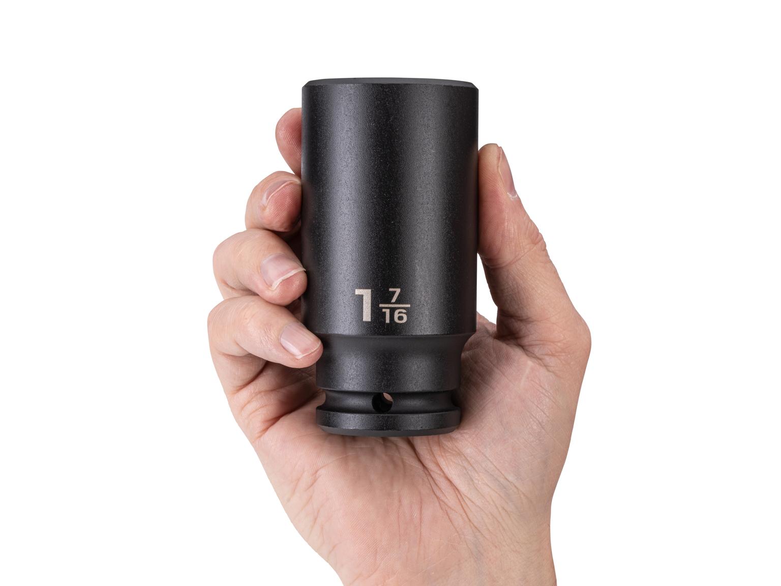 Person holding Tekton impact drive 6-point socket. Item #SID33036