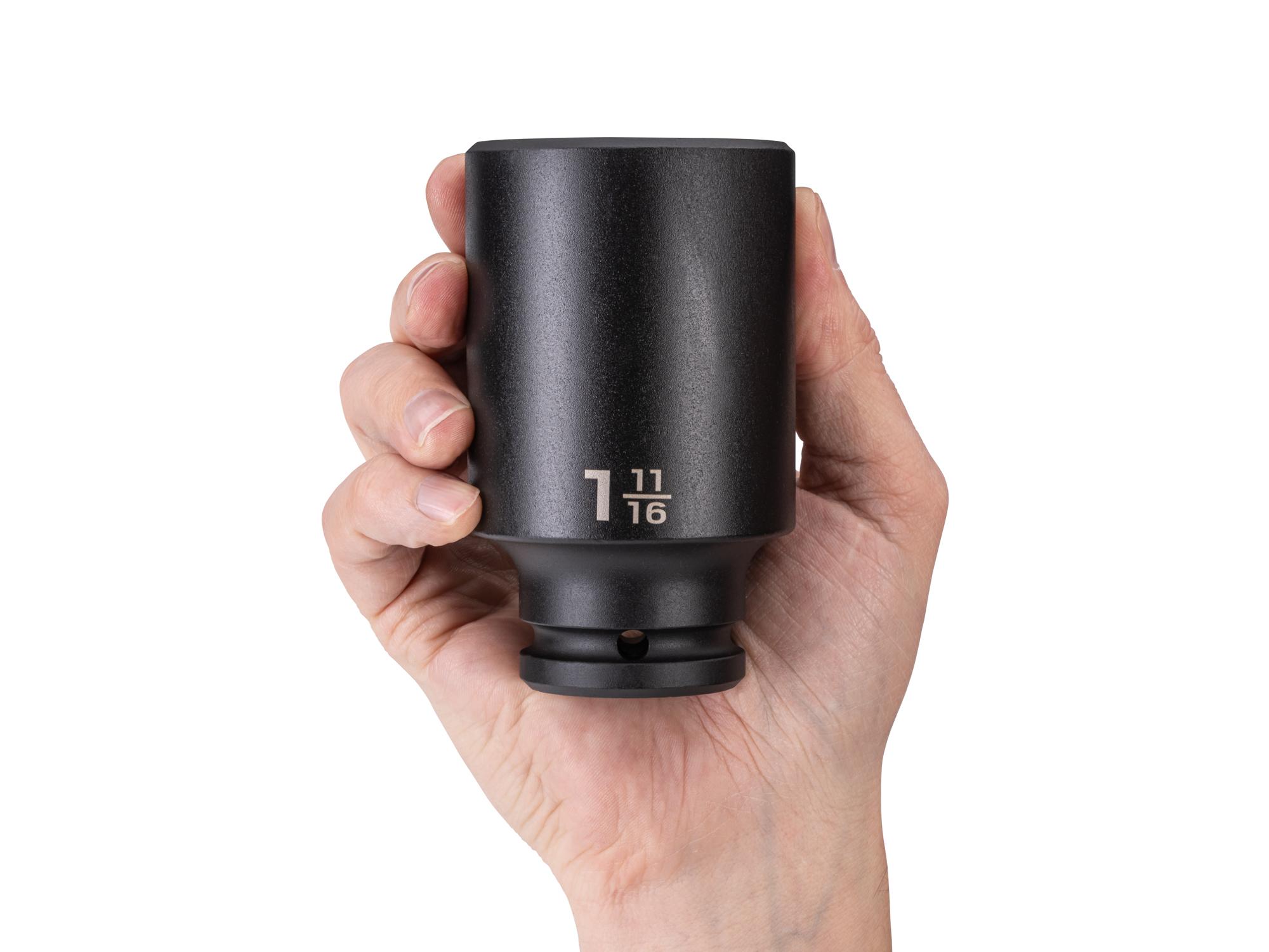 Person holding Tekton impact drive 6-point socket. Item #SID33043