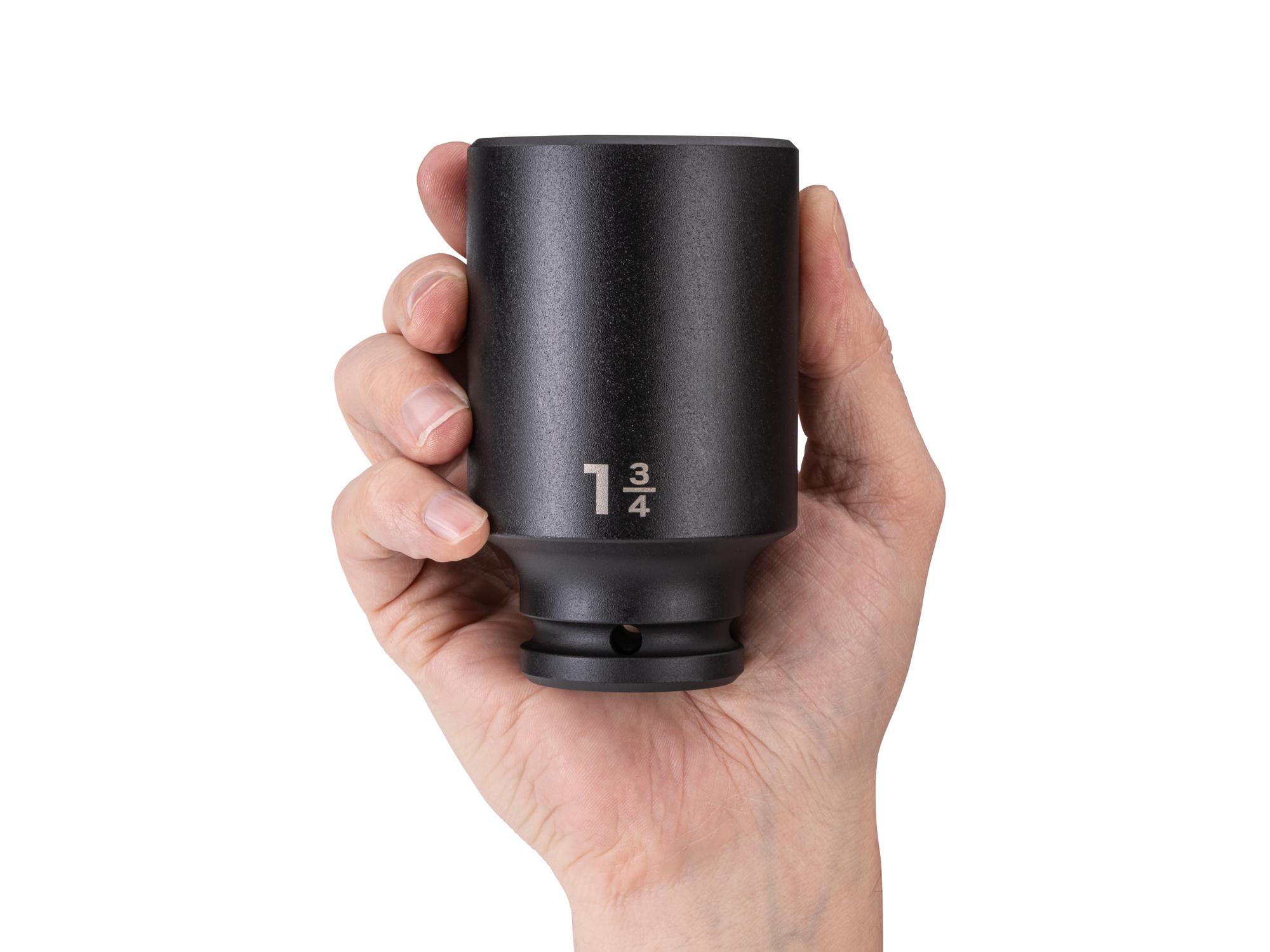 Person holding Tekton impact drive 6-point socket. Item #SID33045