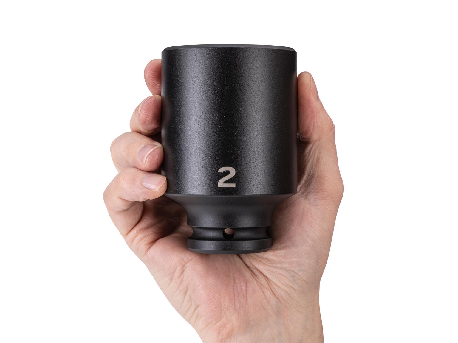 Person holding Tekton impact drive 6-point socket. Item #SID33051