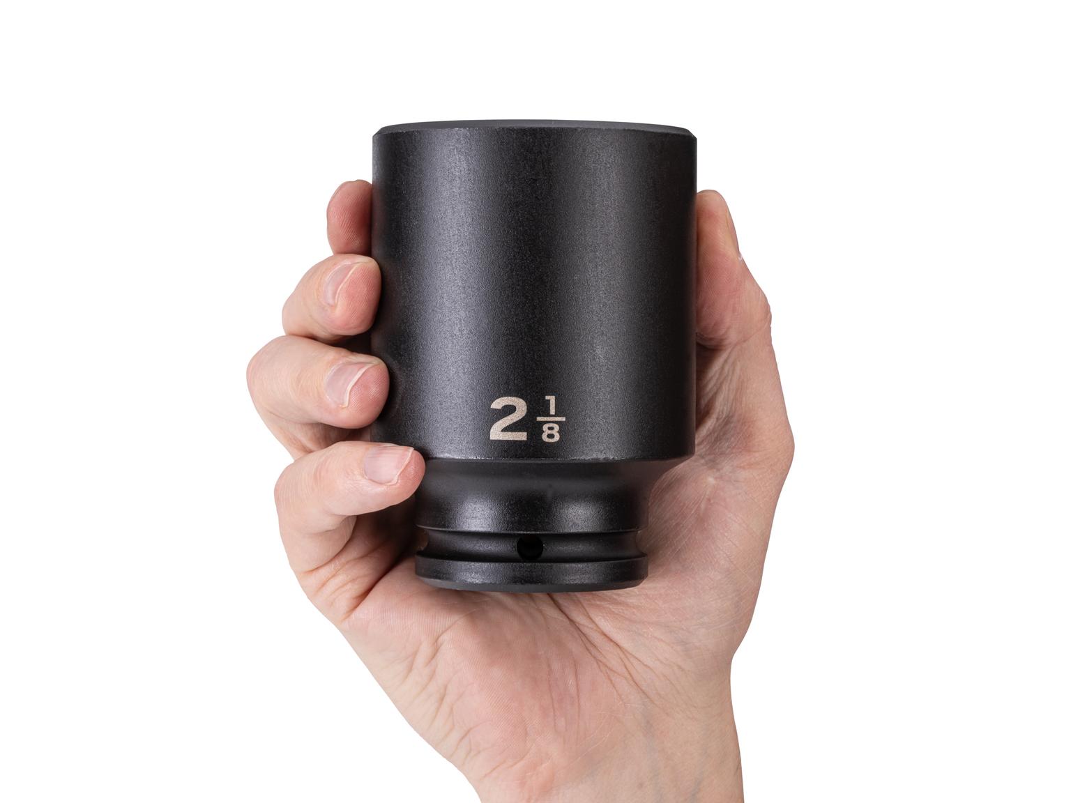 Person holding Tekton impact drive 6-point socket. Item #SID33054