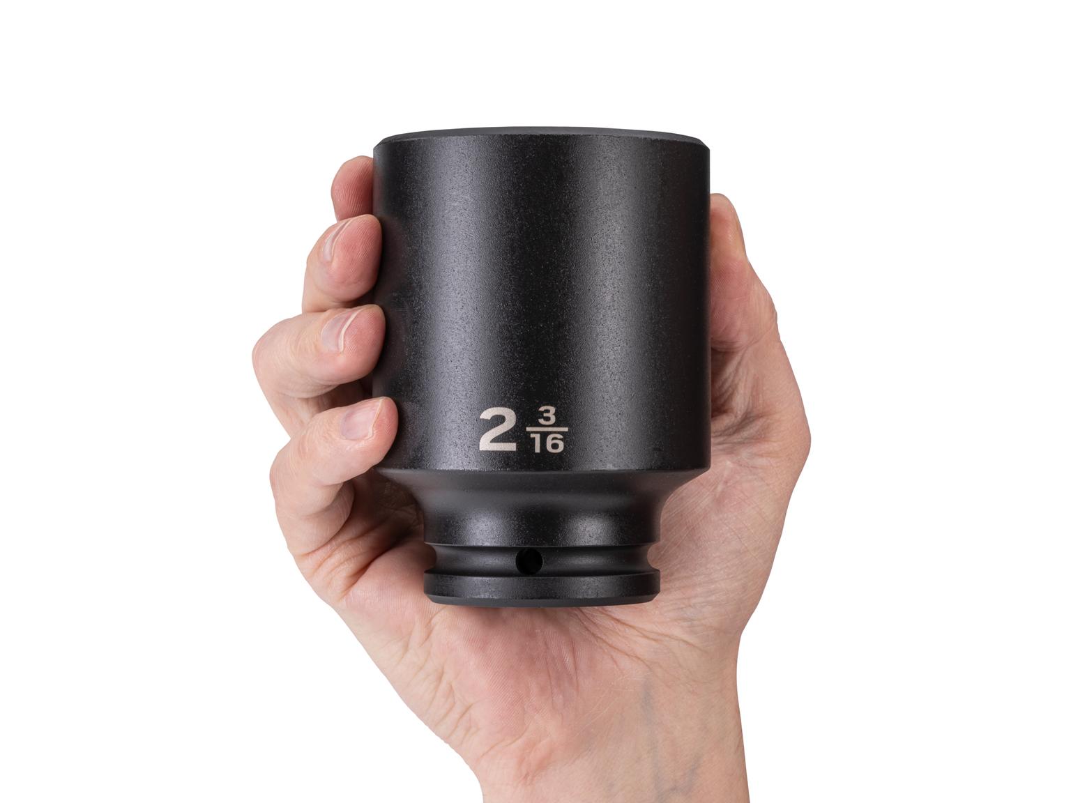 Person holding Tekton impact drive 6-point socket. Item #SID33055