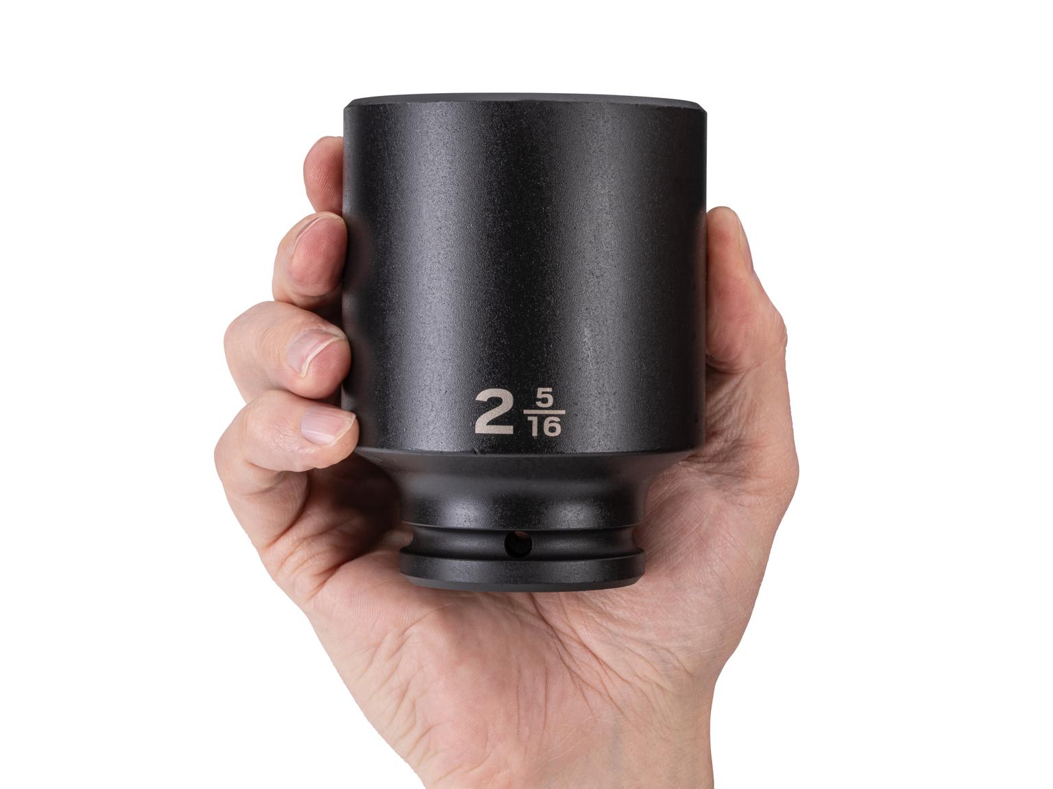 Person holding Tekton impact drive 6-point socket. Item #SID33059