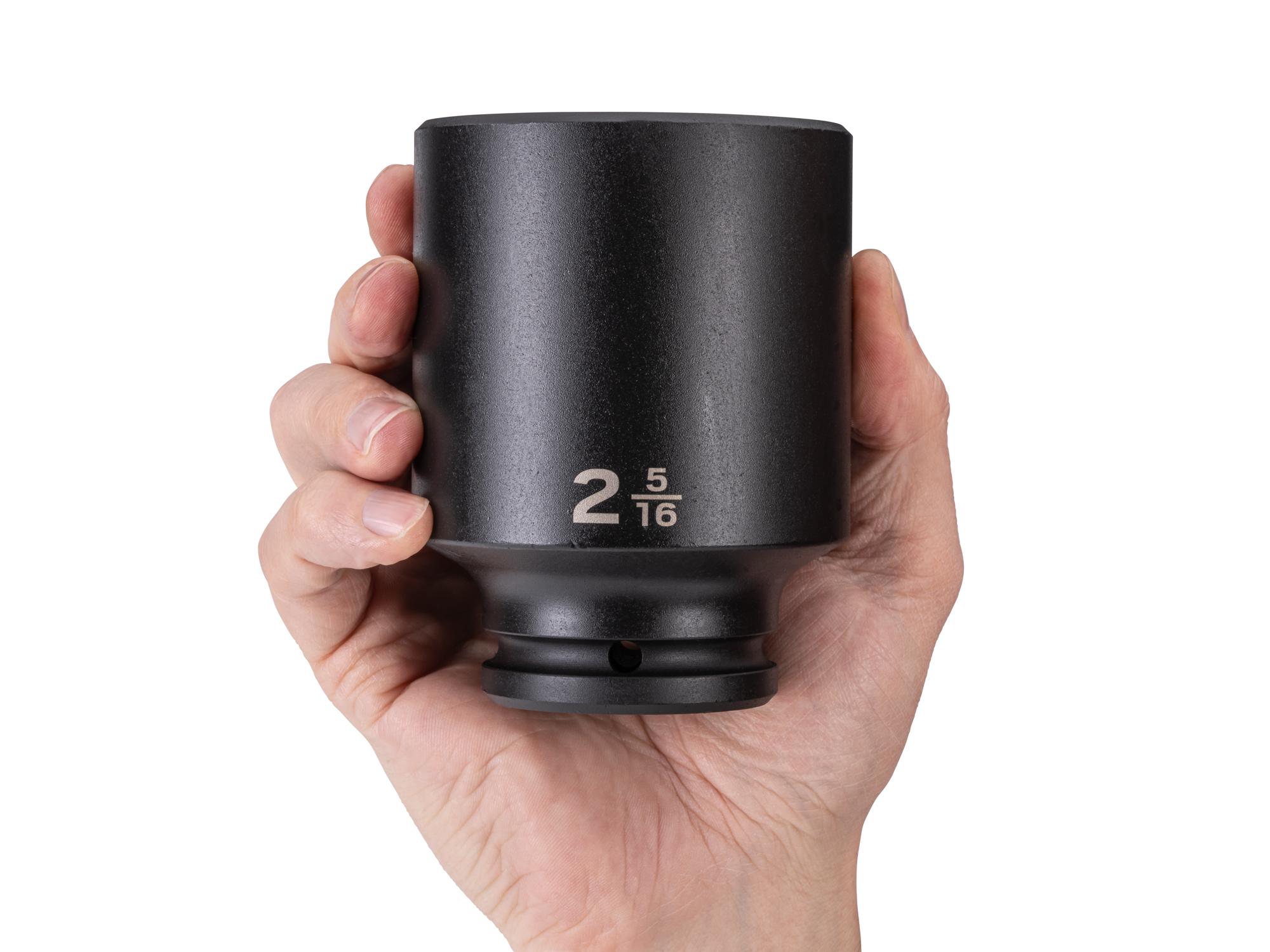 Person holding Tekton impact drive 6-point socket. Item #SID33059