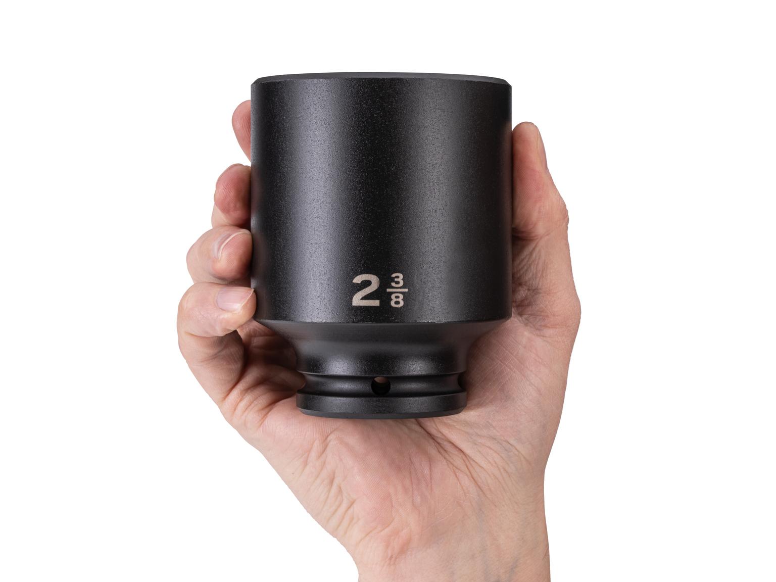 Person holding Tekton impact drive 6-point socket. Item #SID33060