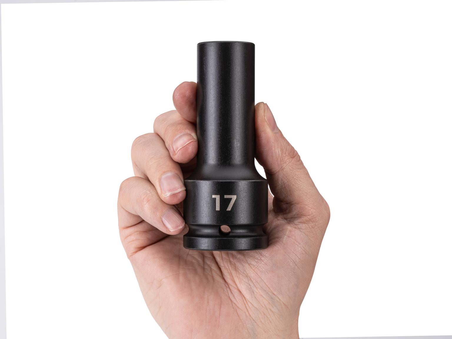 Person holding Tekton impact drive 6-point socket. Item #SID33117