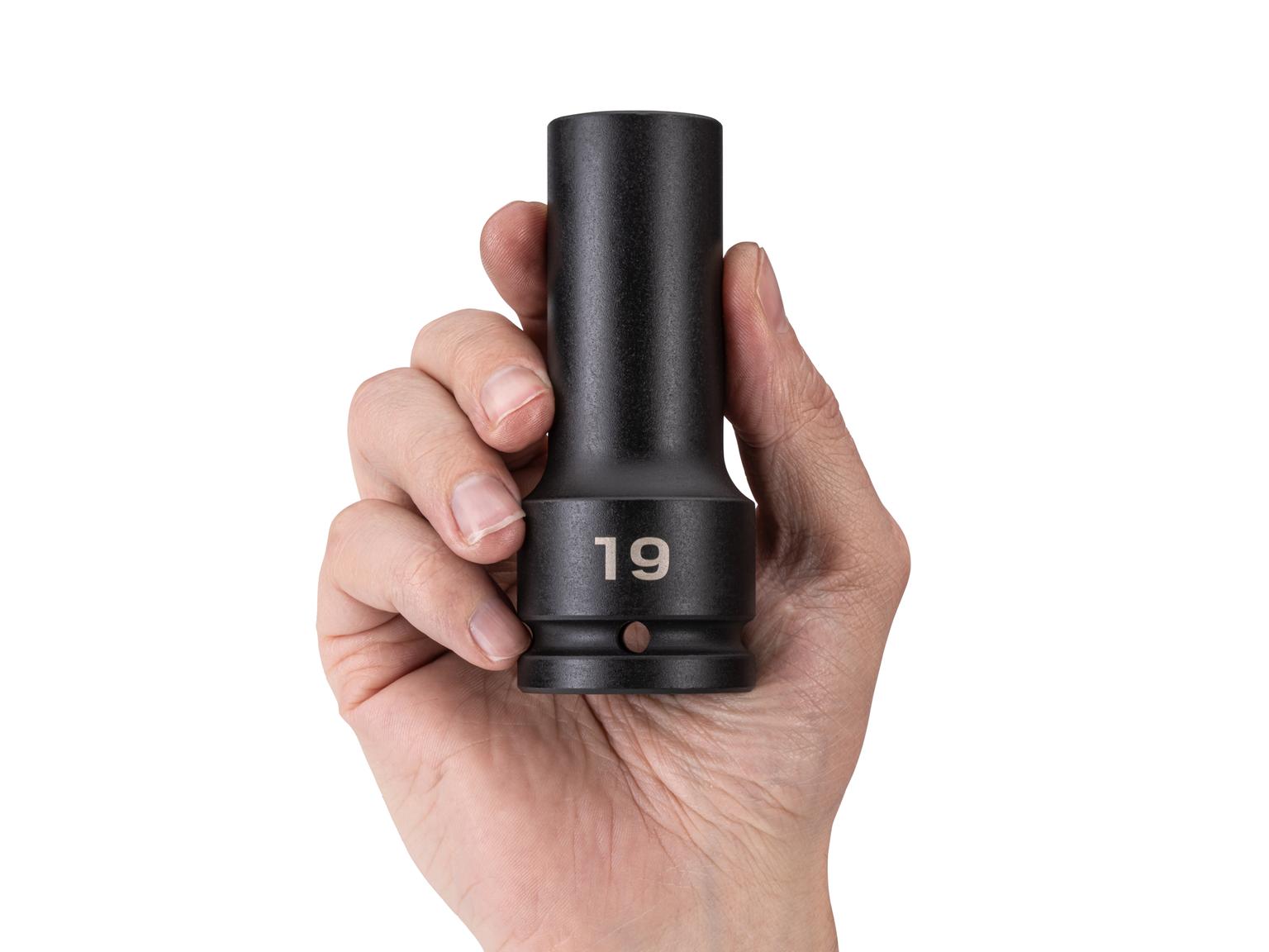 Person holding Tekton impact drive 6-point socket. Item #SID33119