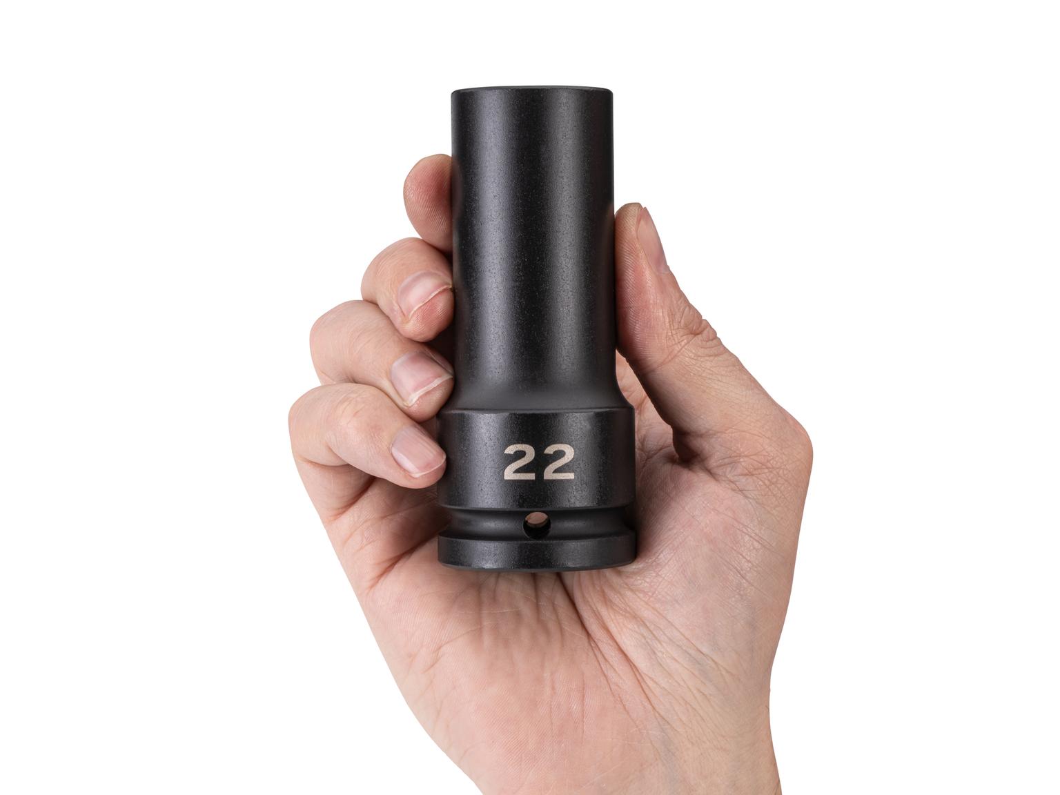 Person holding Tekton impact drive 6-point socket. Item #SID33122