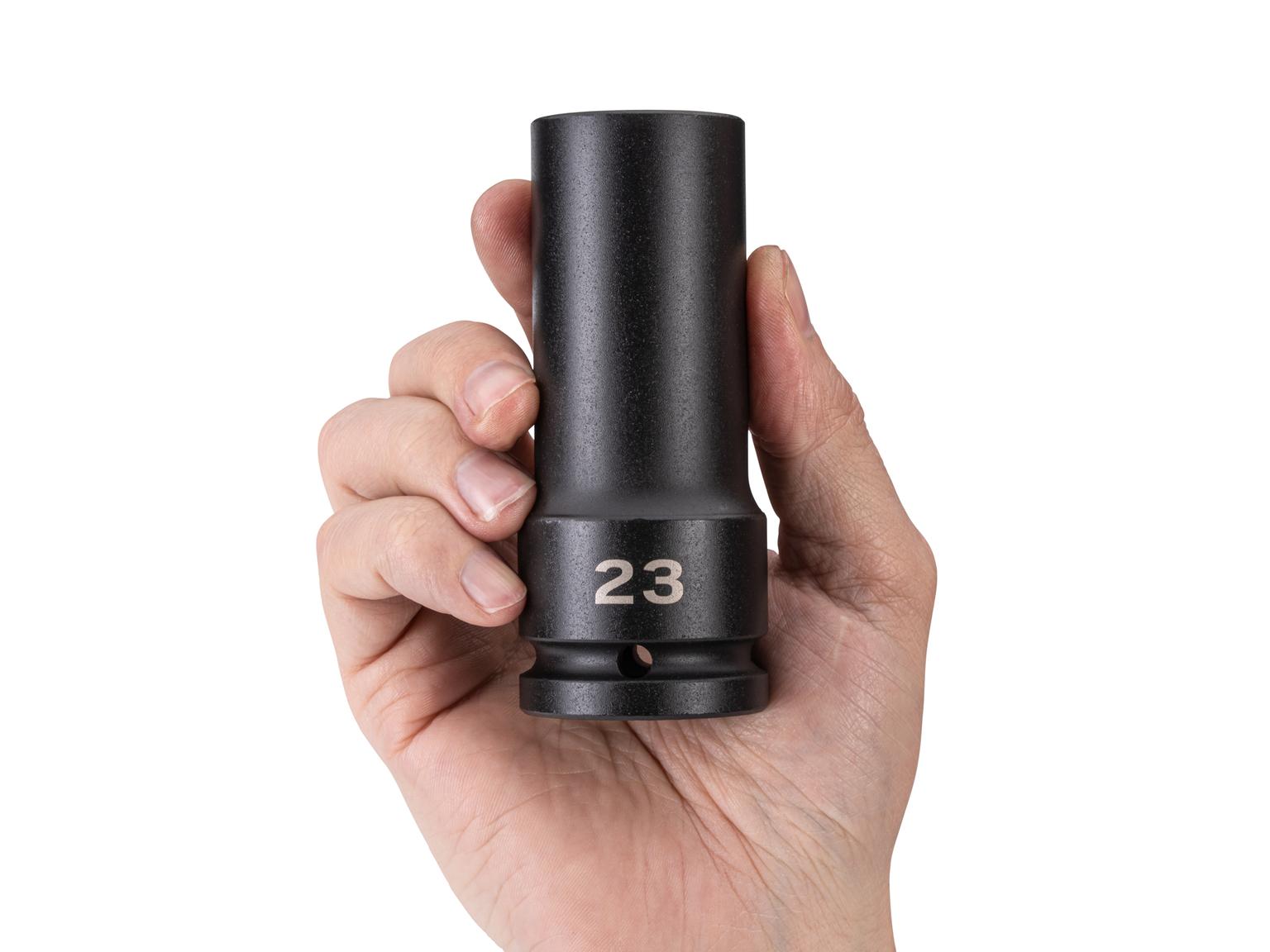 Person holding Tekton impact drive 6-point socket. Item #SID33123