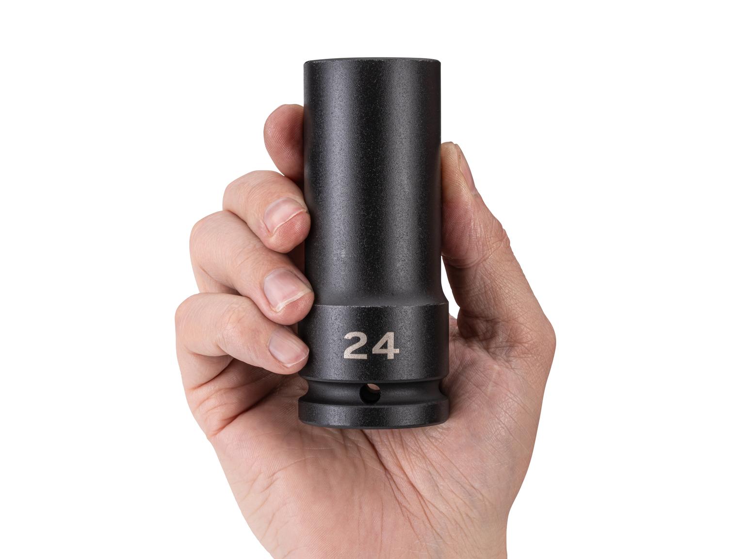 Person holding Tekton impact drive 6-point socket. Item #SID33124