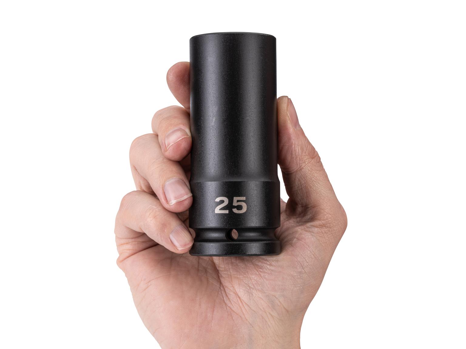 Person holding Tekton impact drive 6-point socket. Item #SID33125