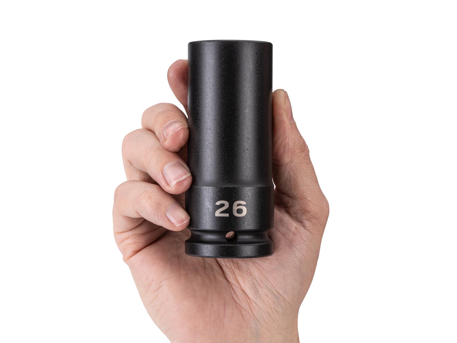 Person holding Tekton impact drive 6-point socket. Item #SID33126