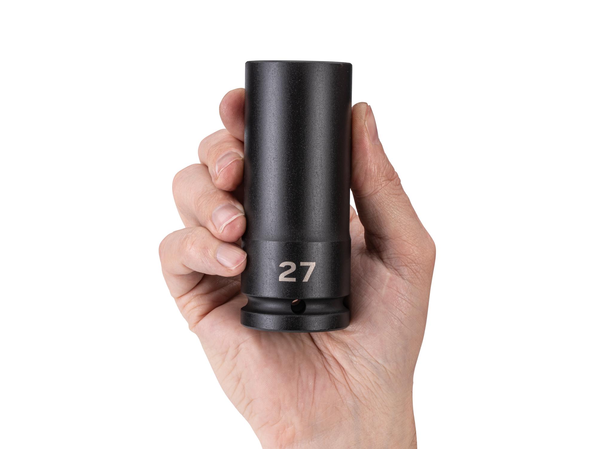Person holding Tekton impact drive 6-point socket. Item #SID33127