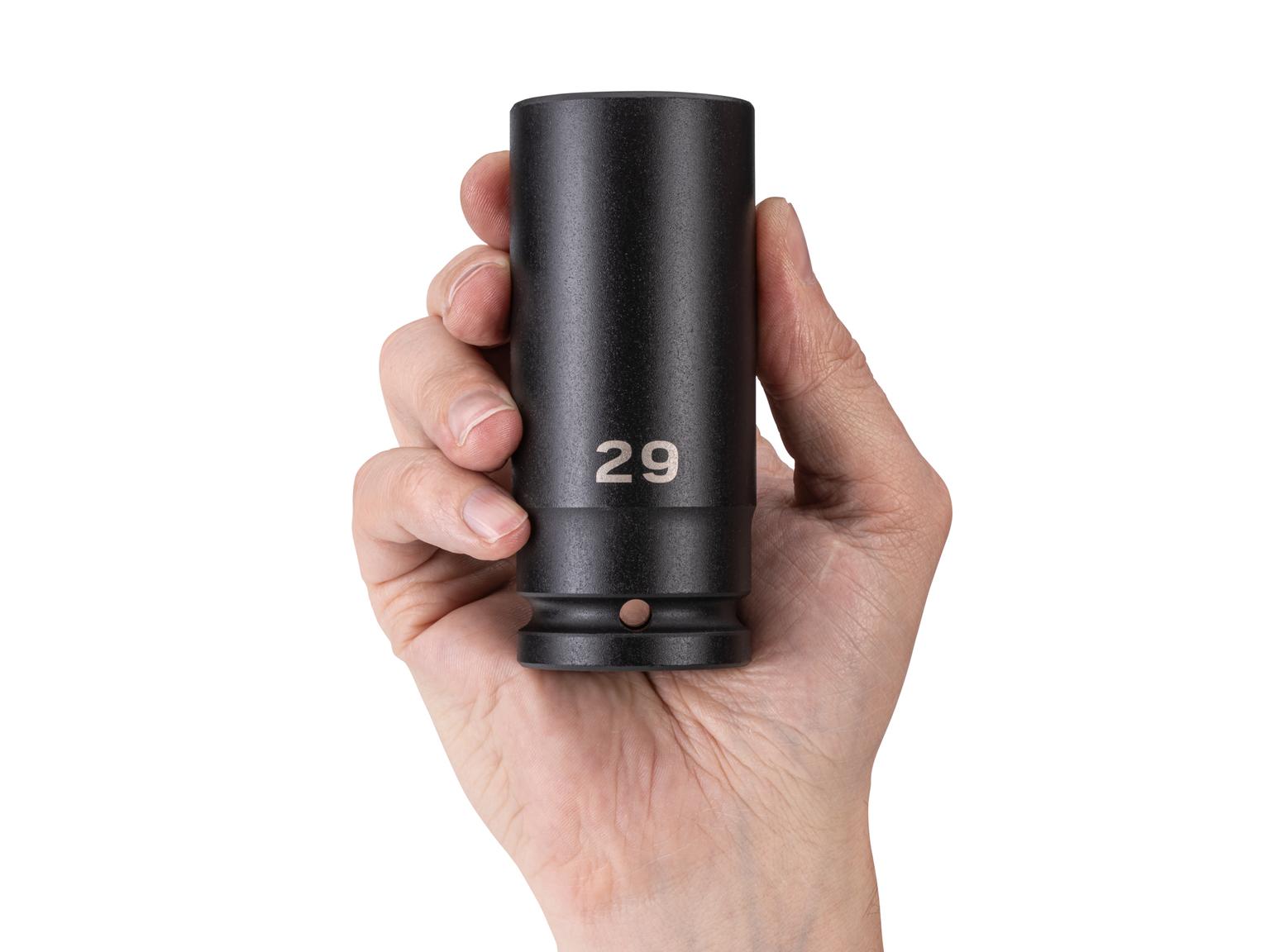 Person holding Tekton impact drive 6-point socket. Item #SID33129