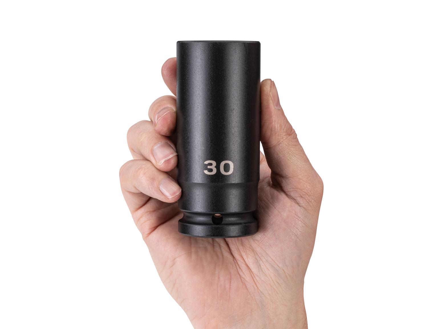 Person holding Tekton impact drive 6-point socket. Item #SID33130