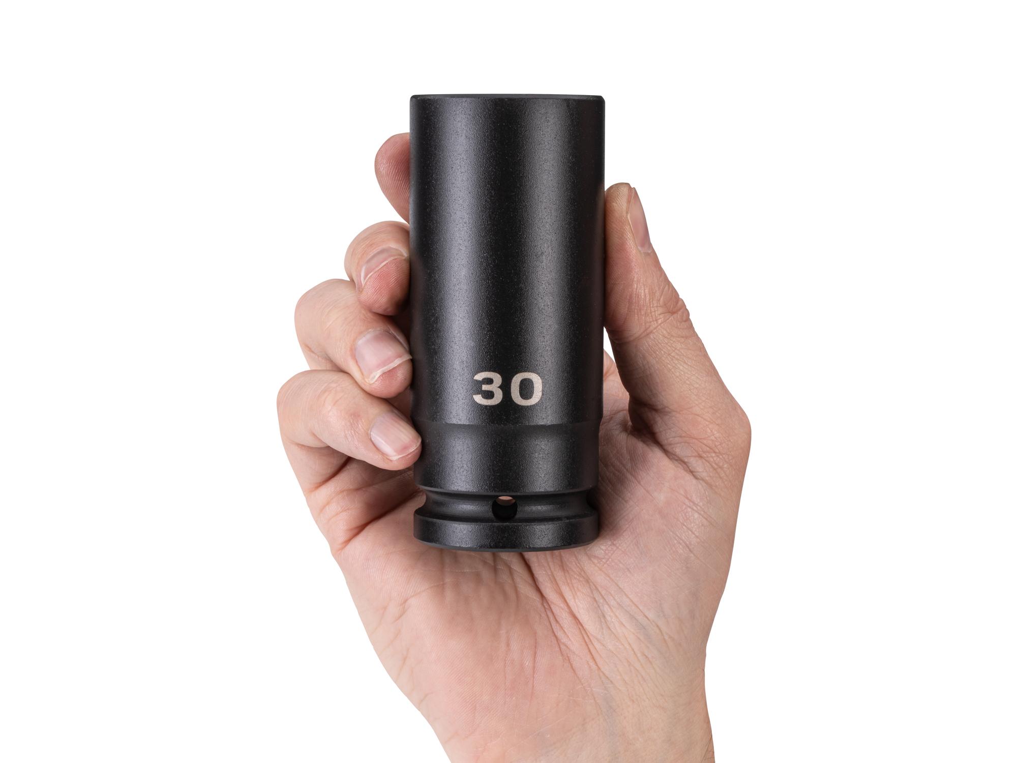 Person holding Tekton impact drive 6-point socket. Item #SID33130
