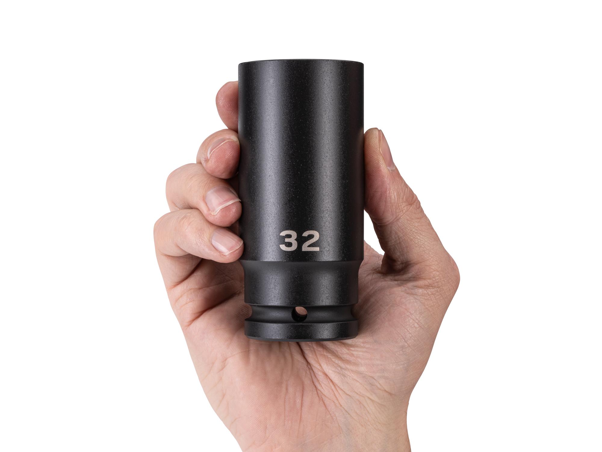 Person holding Tekton impact drive 6-point socket. Item #SID33132