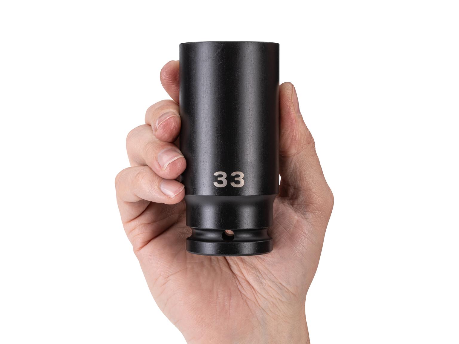 Person holding Tekton impact drive 6-point socket. Item #SID33133