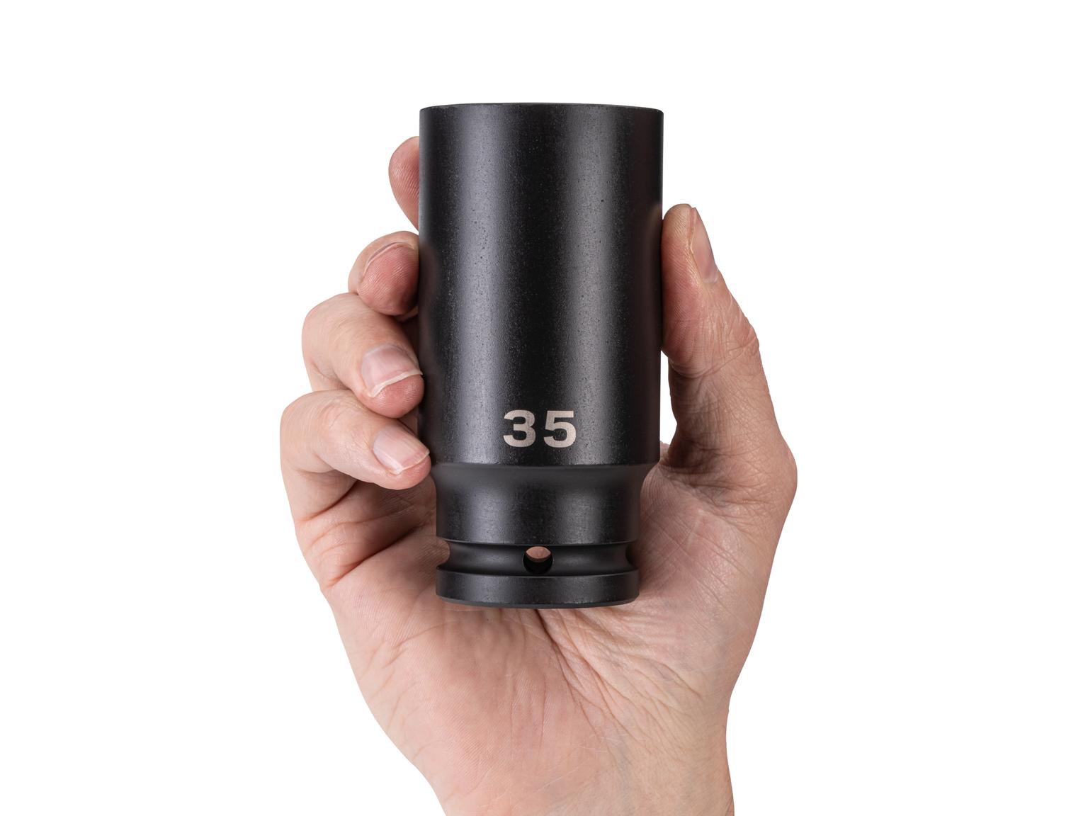 Person holding Tekton impact drive 6-point socket. Item #SID33135