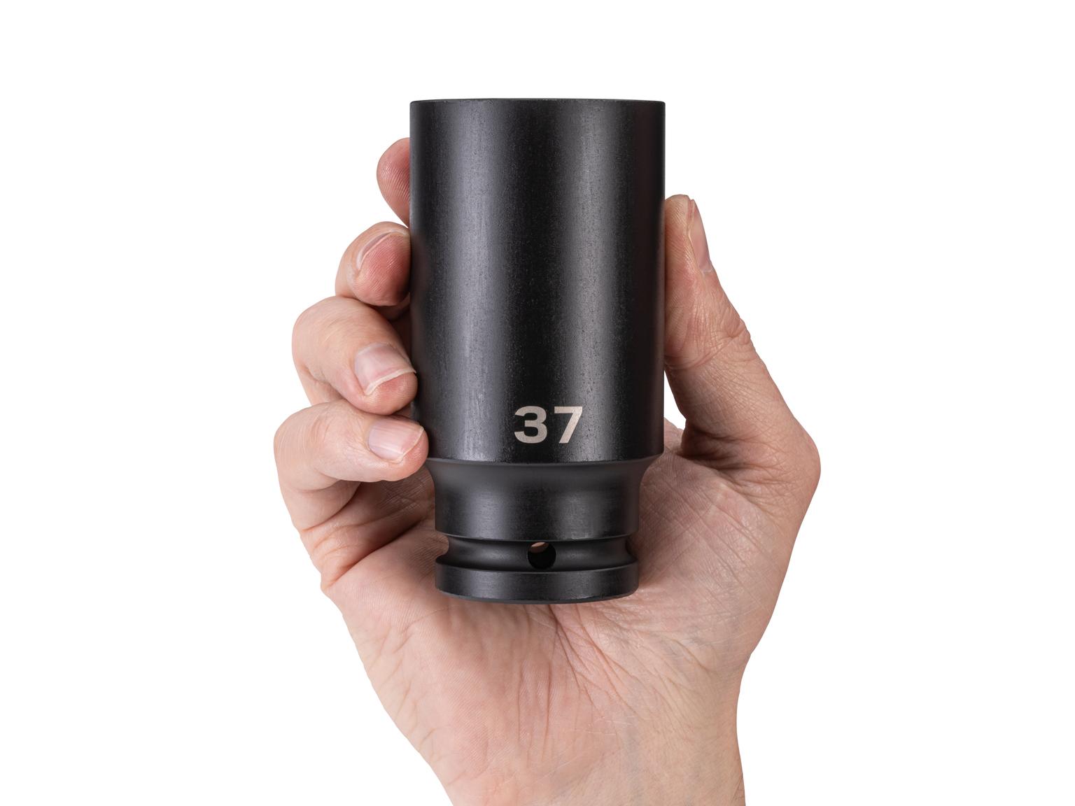 Person holding Tekton impact drive 6-point socket. Item #SID33137