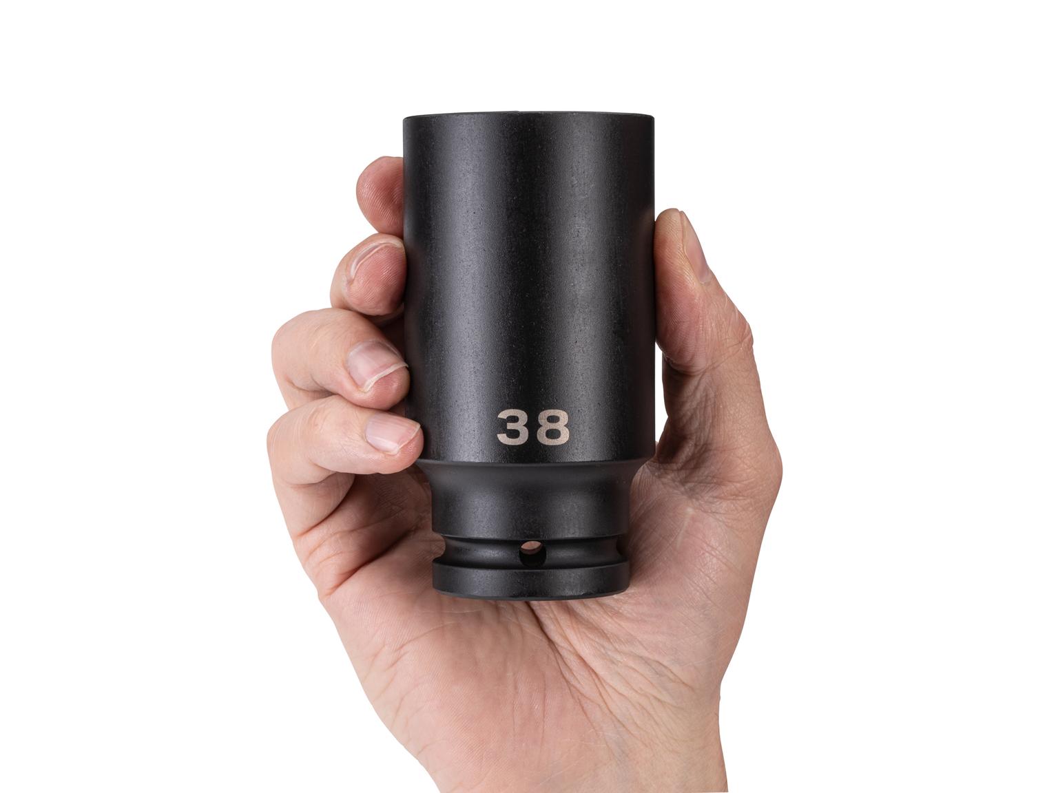 Person holding Tekton impact drive 6-point socket. Item #SID33138