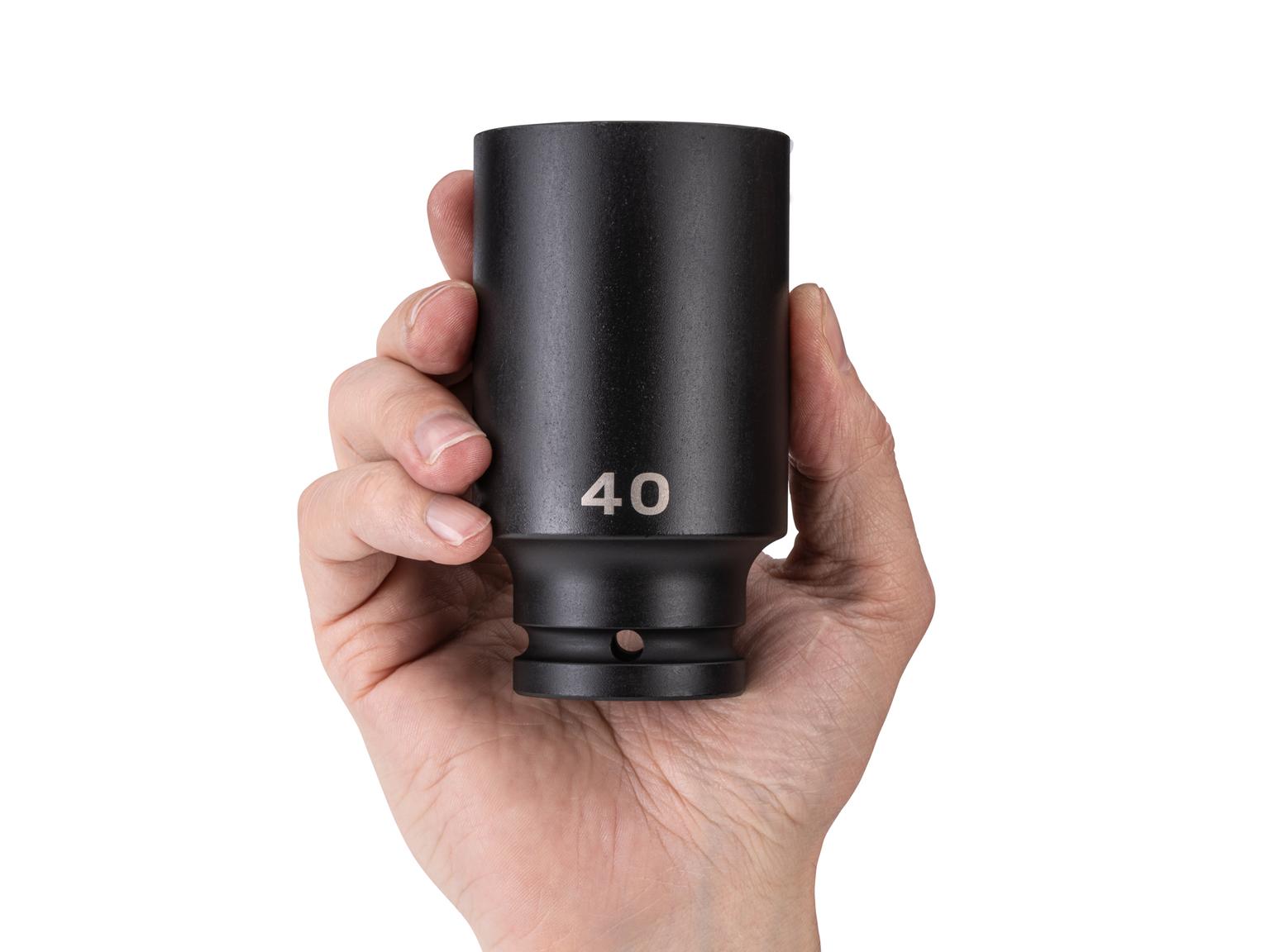 Person holding Tekton impact drive 6-point socket. Item #SID33140