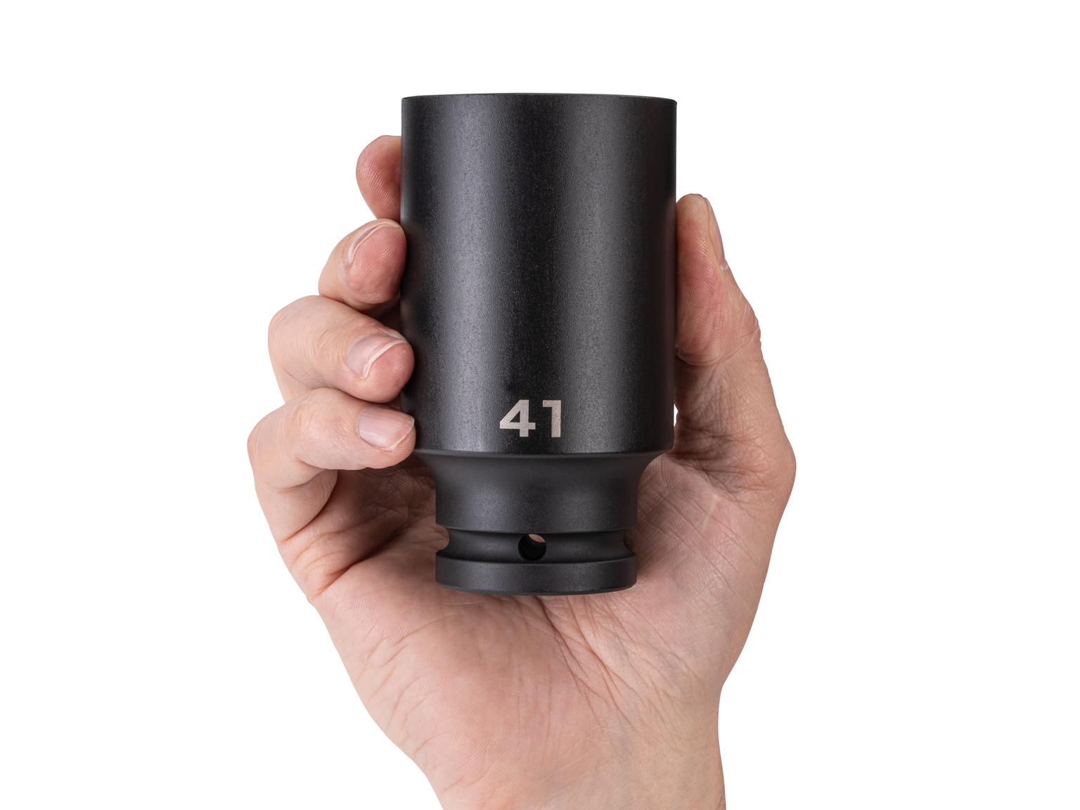 Person holding Tekton impact drive 6-point socket. Item #SID33141