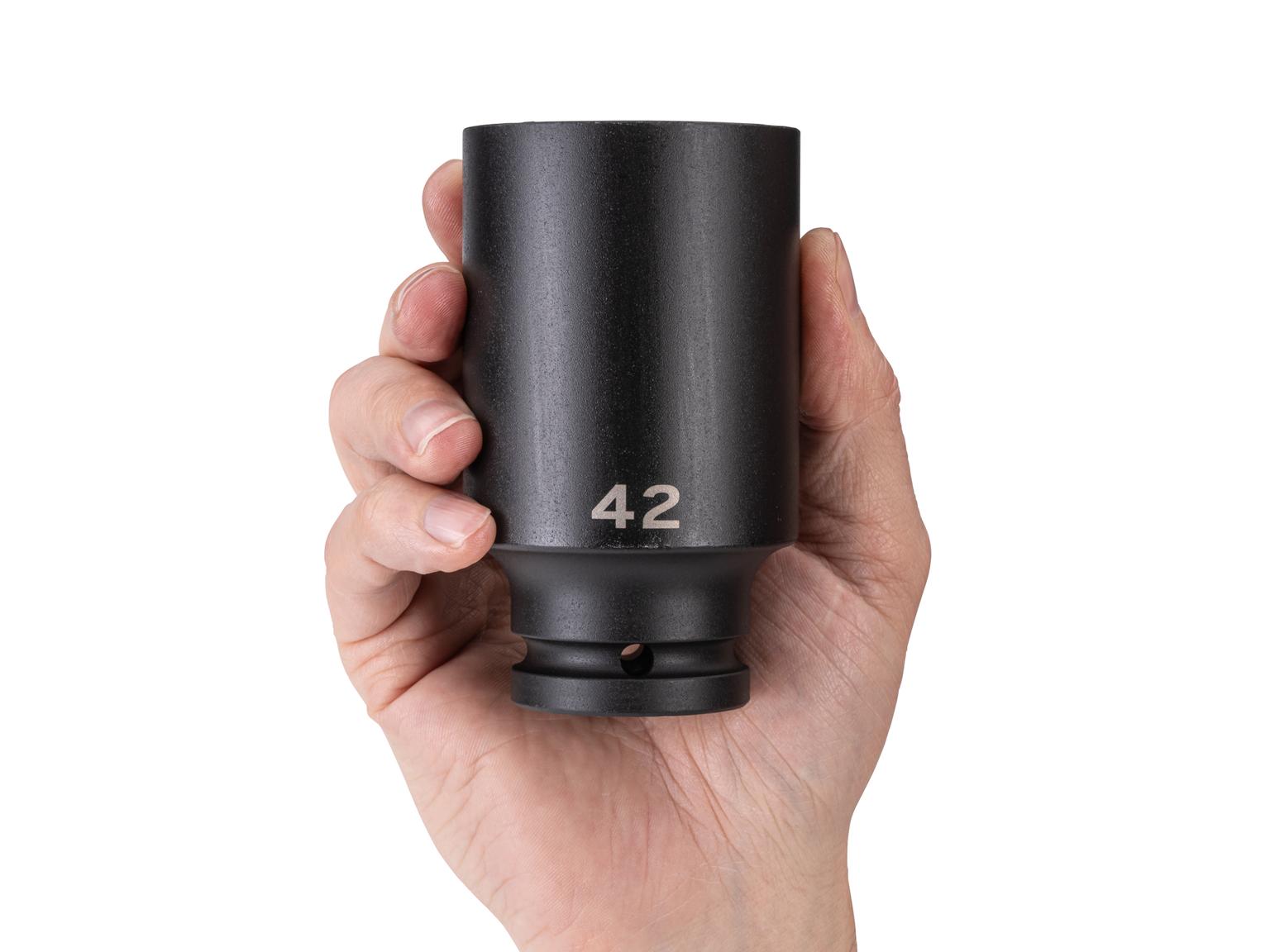 Person holding Tekton impact drive 6-point socket. Item #SID33142