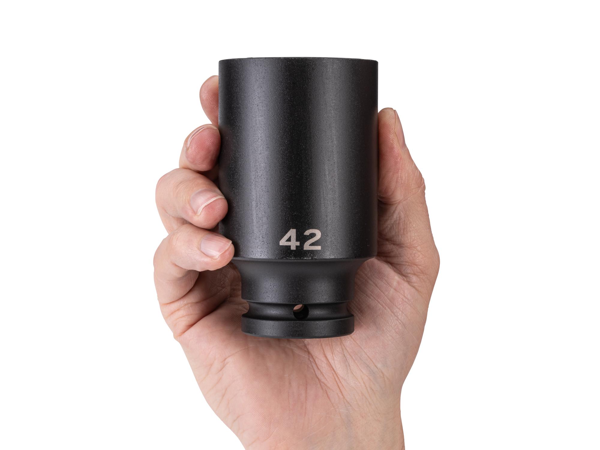 Person holding Tekton impact drive 6-point socket. Item #SID33142