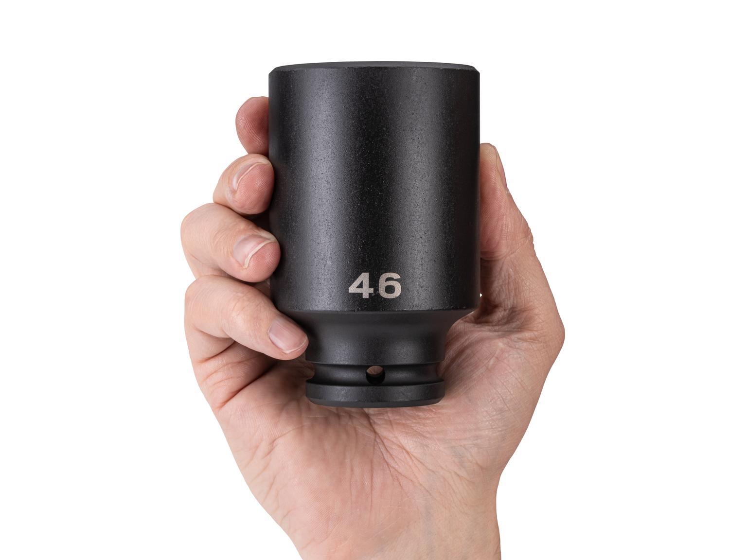 Person holding Tekton impact drive 6-point socket. Item #SID33146