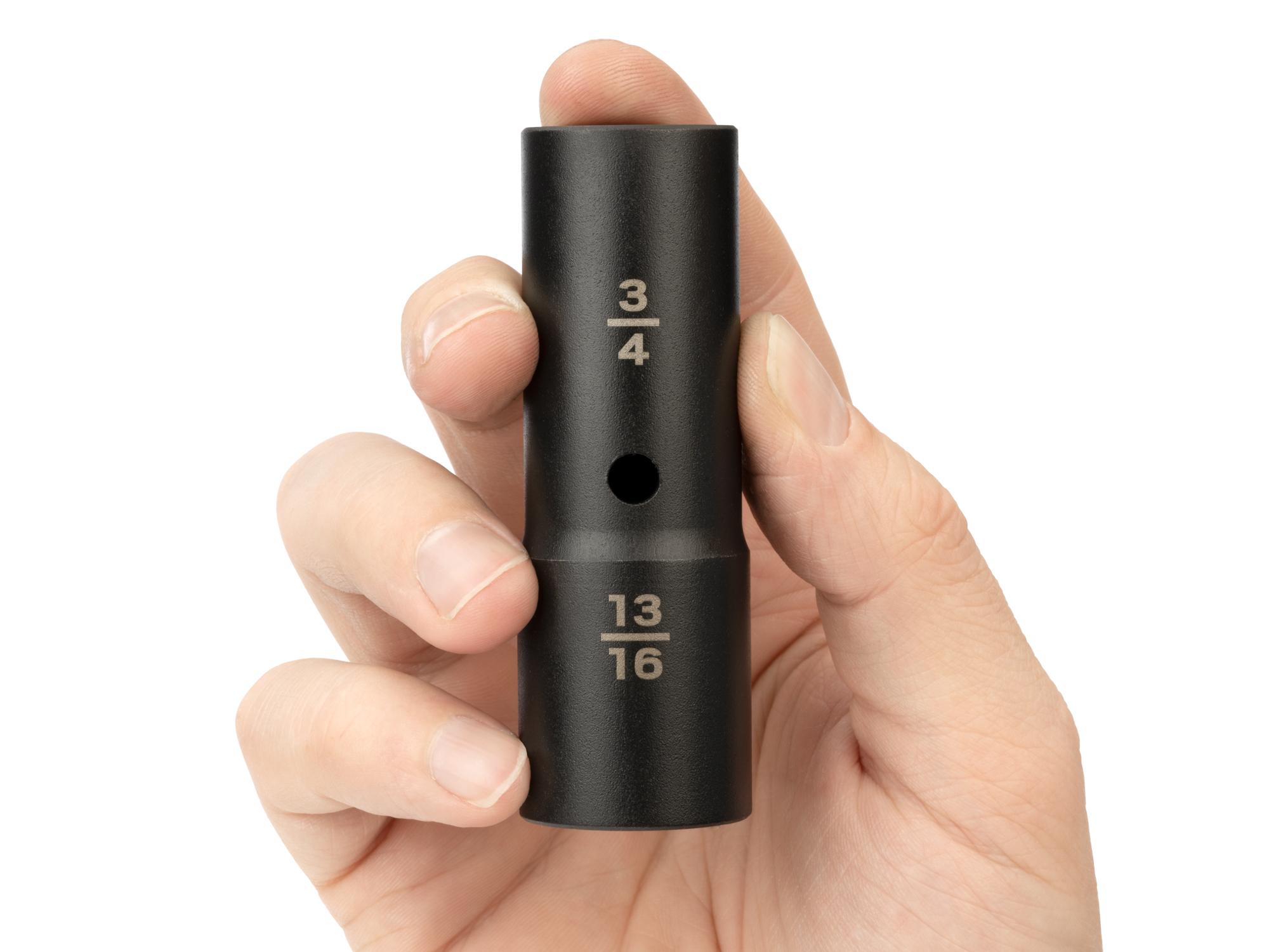Person holding Tekton impact drive 6-point socket. Item #SIF20708