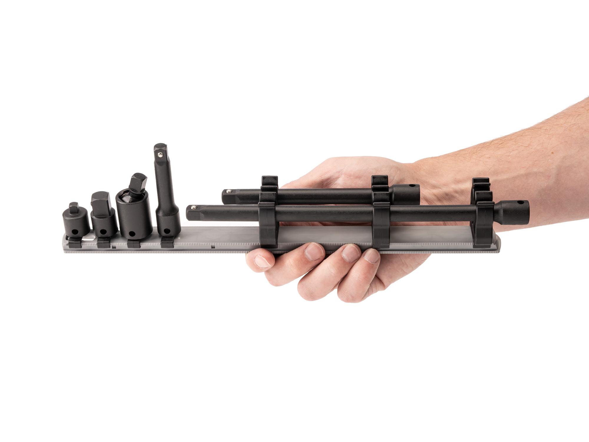 Person holding Tekton 13.1 impact drive accessory set. Item #SIA91101