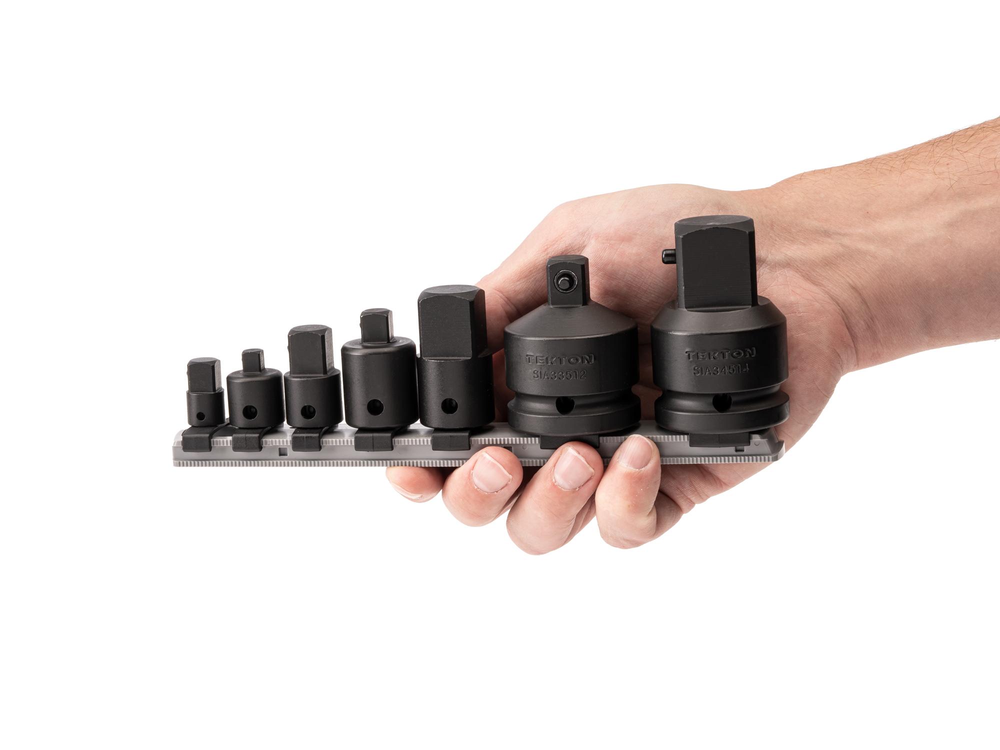 Person holding Tekton 8.1 impact drive accessory set. Item #SIA99127