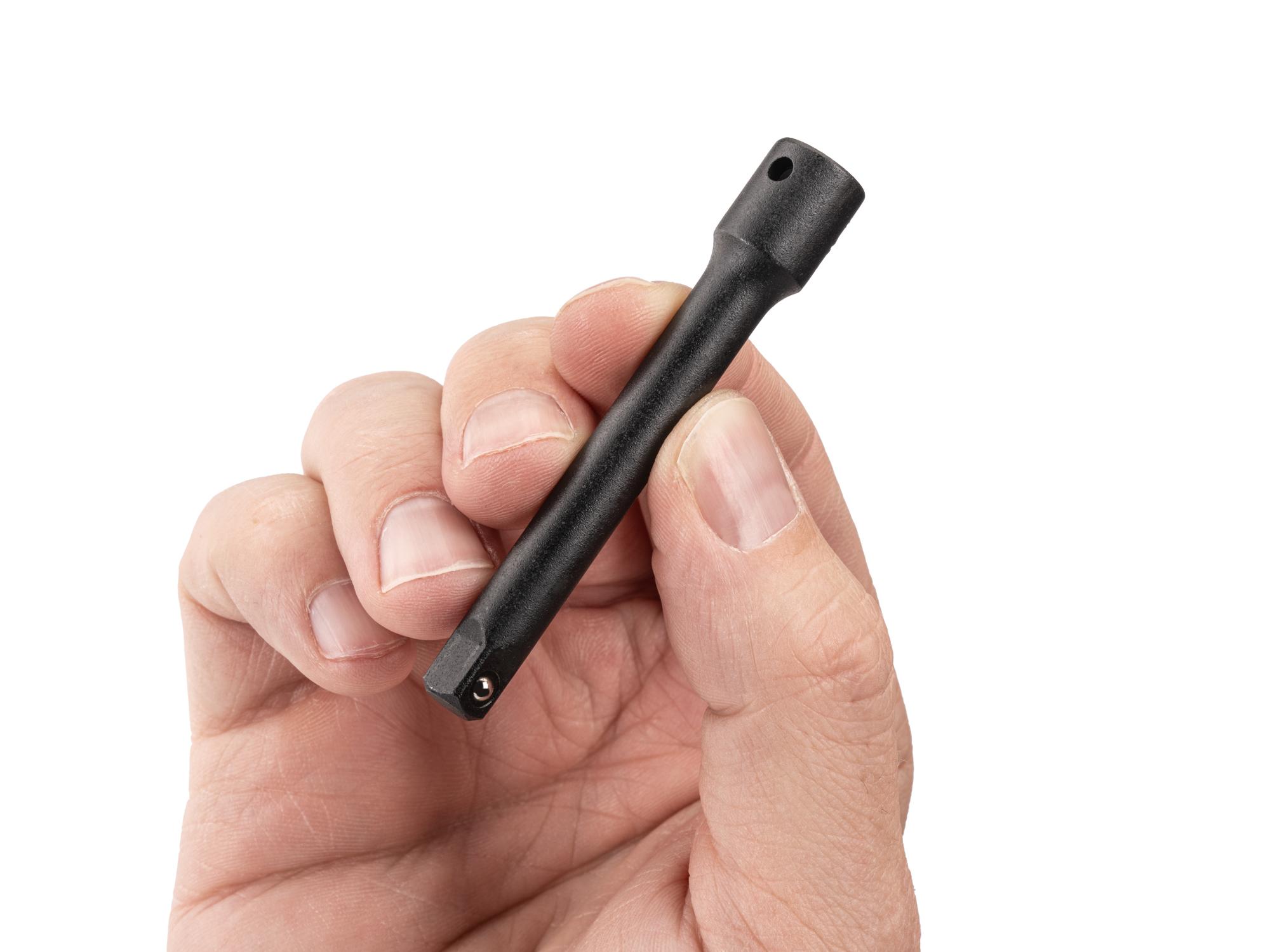 Person holding Tekton 3 inch impact drive accessory. Item #SIA01103